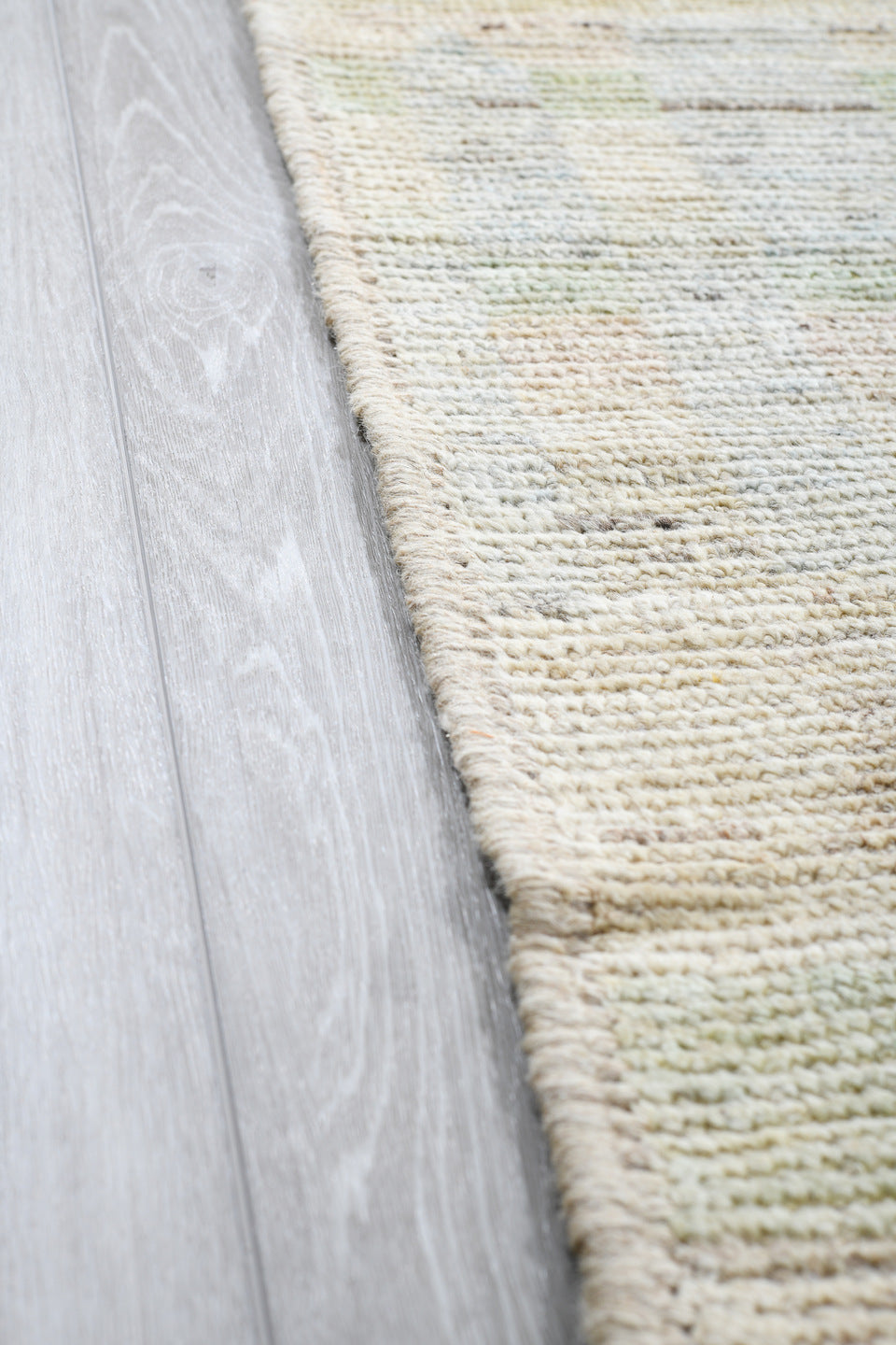 13' x 19' one-of-a-kind handmade vintage Tulu oversize rug. Color palette: ivory, pale blue, cream, celadon, taupe
