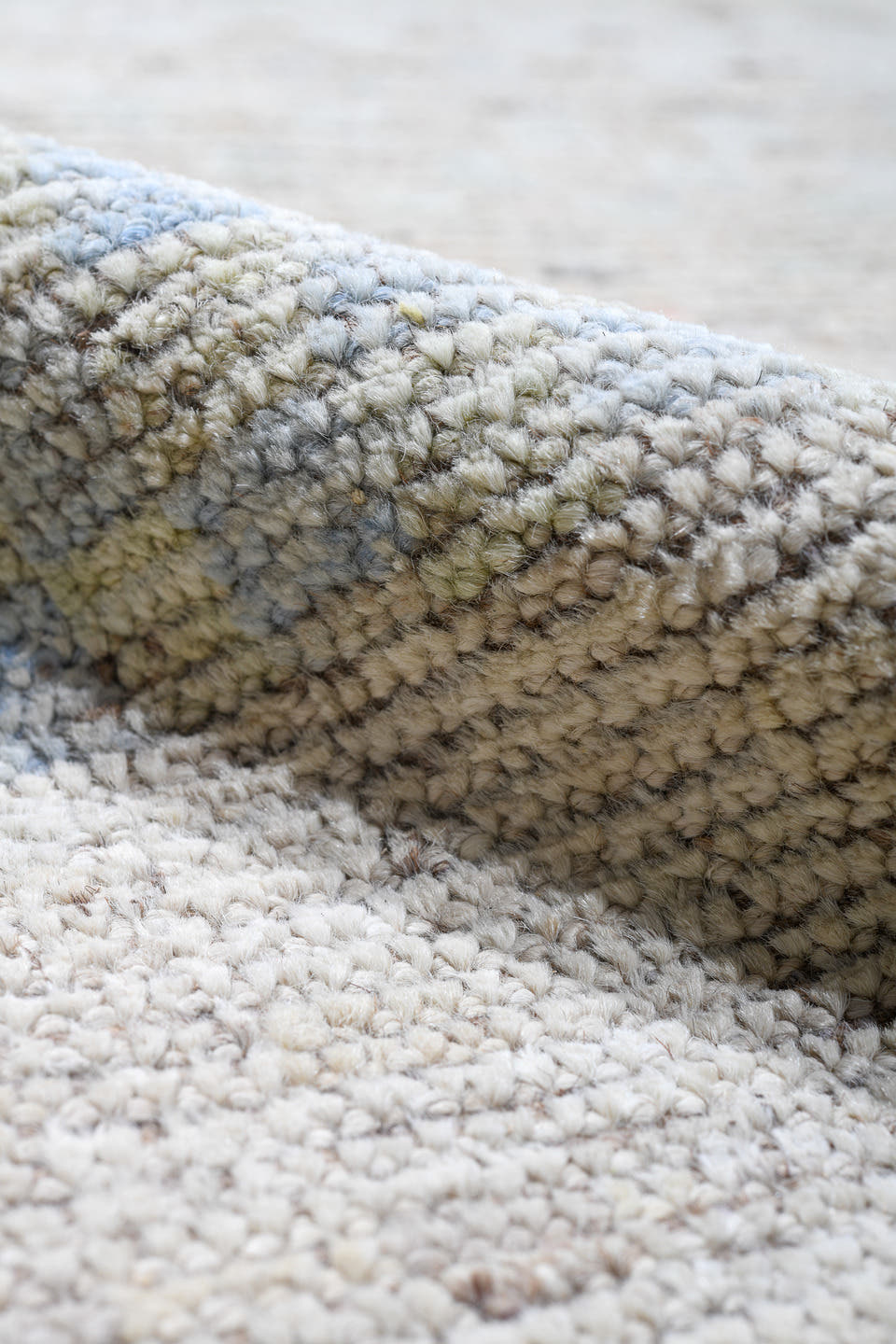13' x 19' one-of-a-kind handmade vintage Tulu oversize rug. Color palette: ivory, cream, pale blue, blush, sand