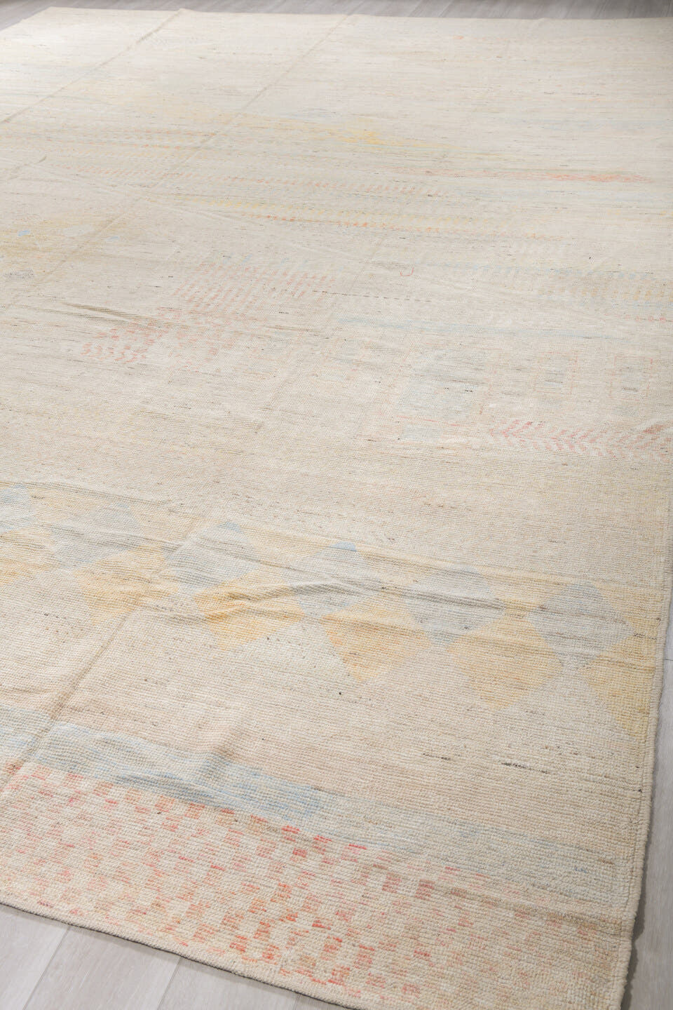 13' x 19' one-of-a-kind handmade vintage Tulu oversize rug. Color palette: ivory, cream, pale blue, blush, soft yellow