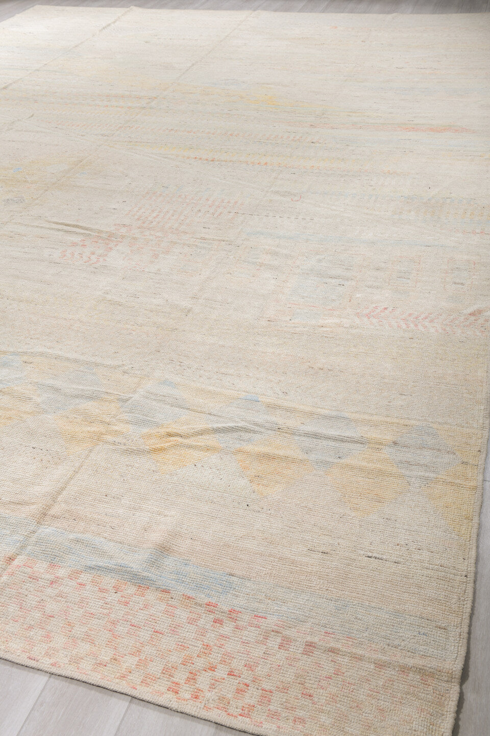 13' x 19' one-of-a-kind handmade vintage Tulu oversize rug. Color palette: ivory, cream, pale blue, blush, soft yellow