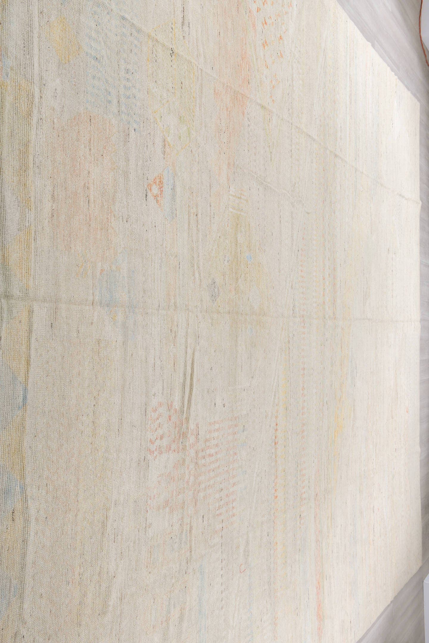13' x 19' one-of-a-kind handmade vintage Tulu oversize rug. Color palette: ivory, cream, pale blue, blush, soft yellow