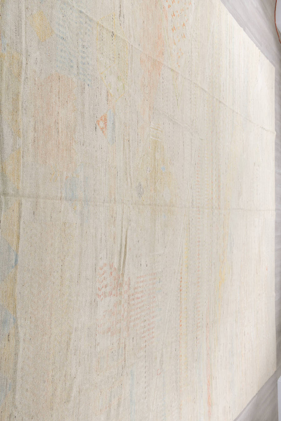 13' x 19' one-of-a-kind handmade vintage Tulu oversize rug. Color palette: ivory, cream, pale blue, blush, soft yellow