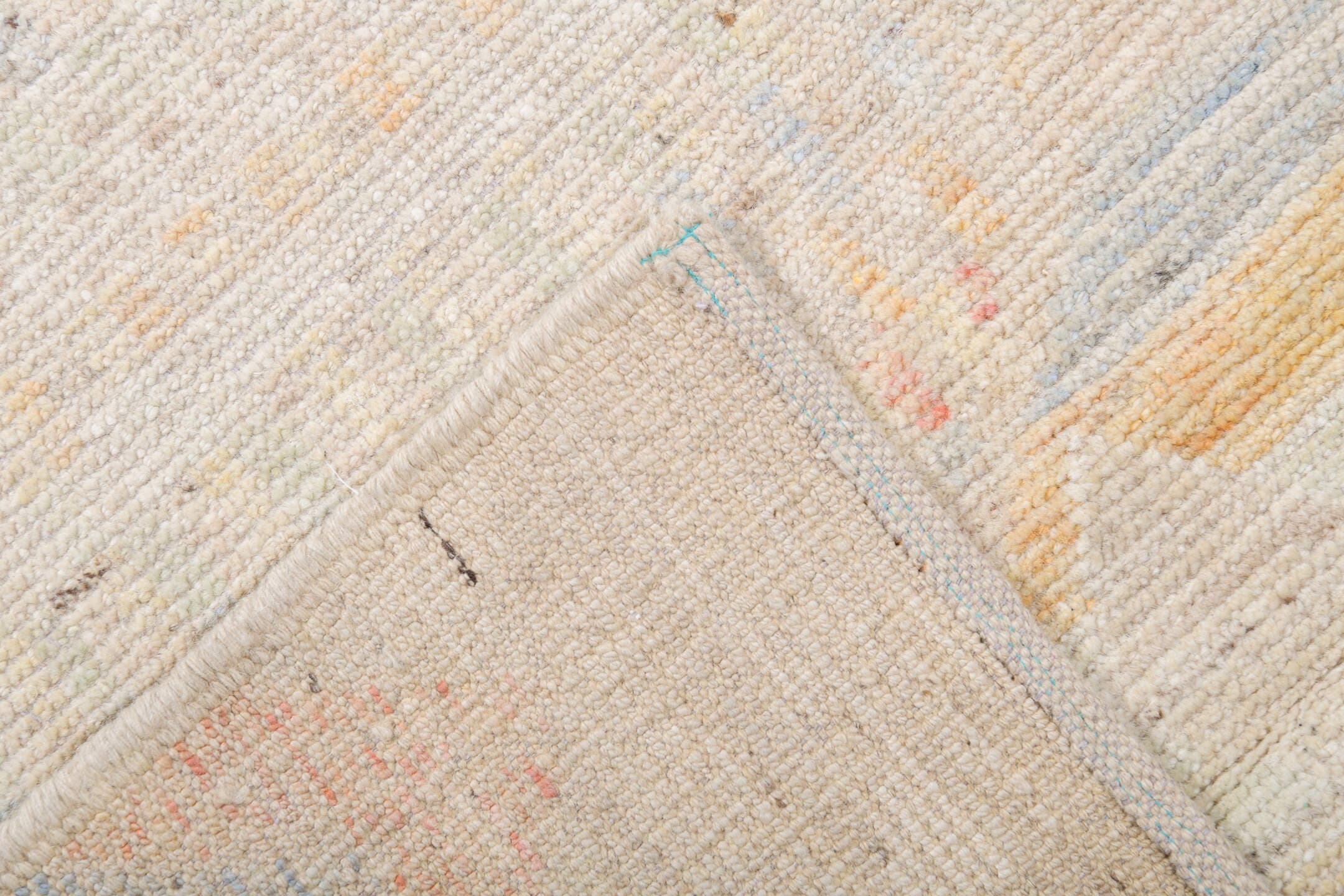 13' x 19' one-of-a-kind handmade vintage Tulu oversize rug. Color palette: ivory, cream, pale blue, blush, soft yellow