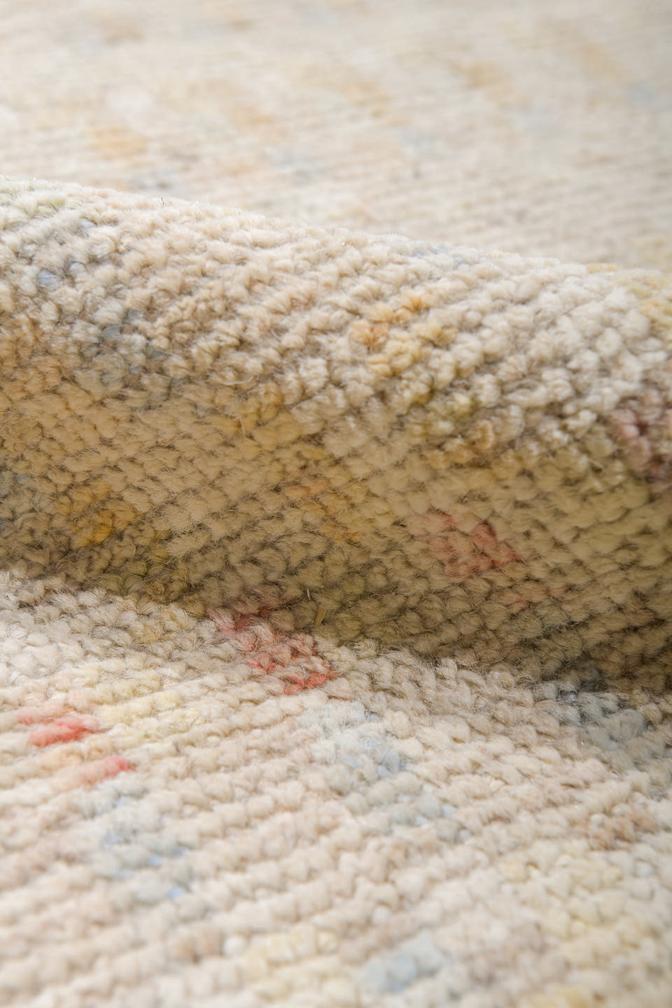 13' x 19' one-of-a-kind handmade vintage Tulu oversize rug. Color palette: ivory, cream, pale blue, blush, soft yellow