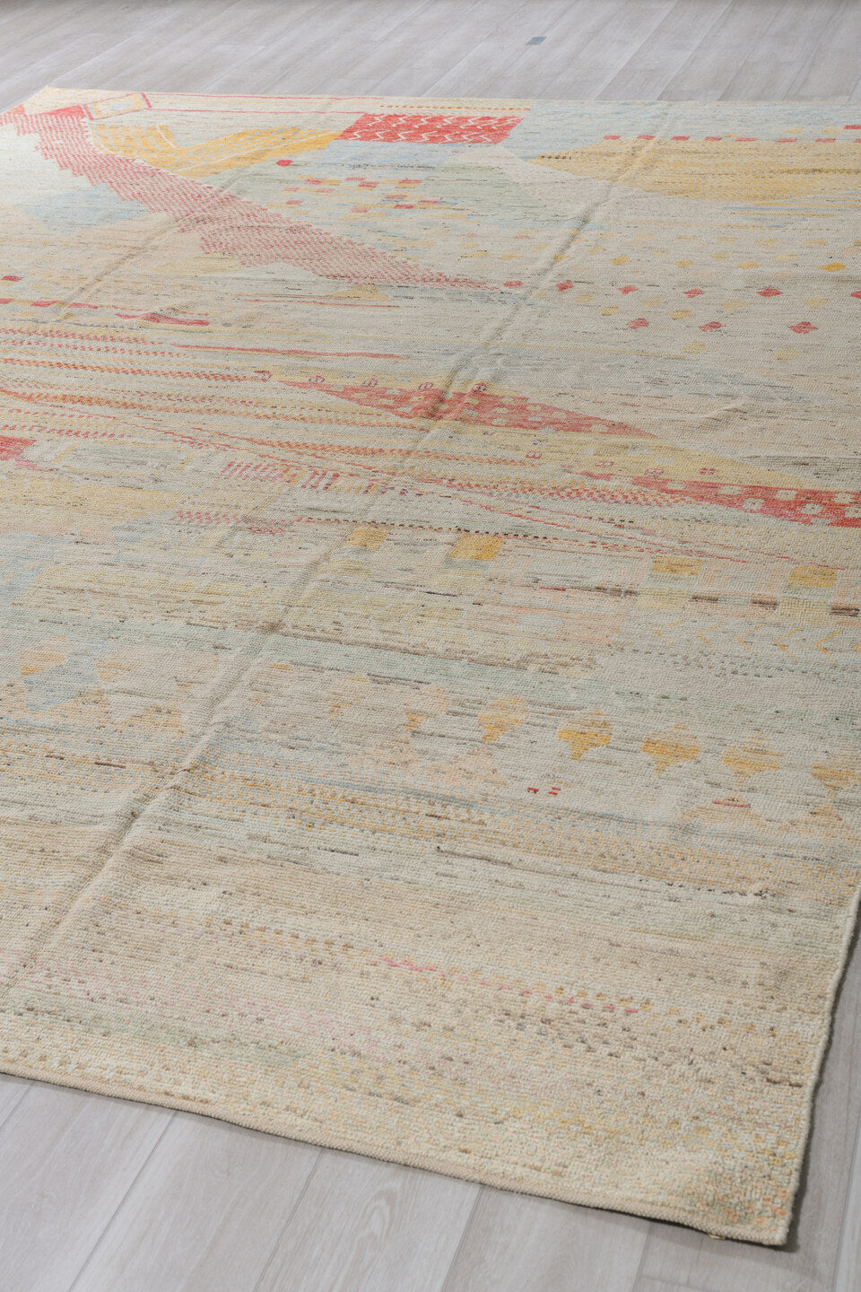 10' x 13' one-of-a-kind handmade vintage Tulu large size rug. Color palette: ivory, cream, pale blue, saffron, coral, sand