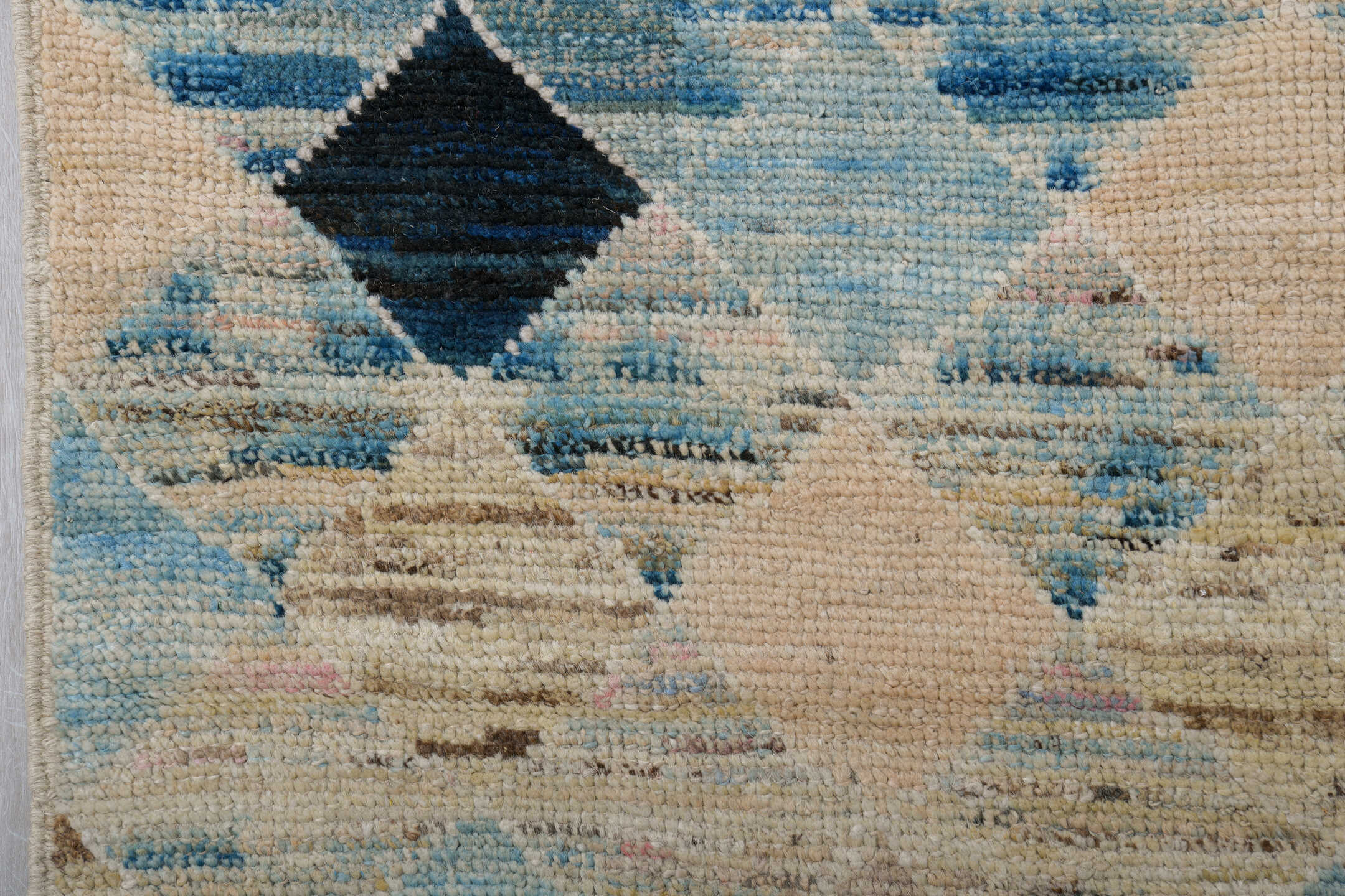 6' x 9' one-of-a-kind handmade vintage Tulu medium size rug. Color palette: ivory, sky_blue, taupe, indigo, brown, beige