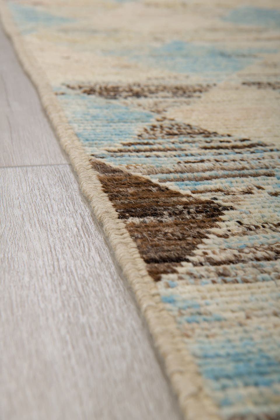 6' x 9' one-of-a-kind handmade vintage Tulu medium size rug. Color palette: ivory, sky_blue, taupe, indigo, brown, beige