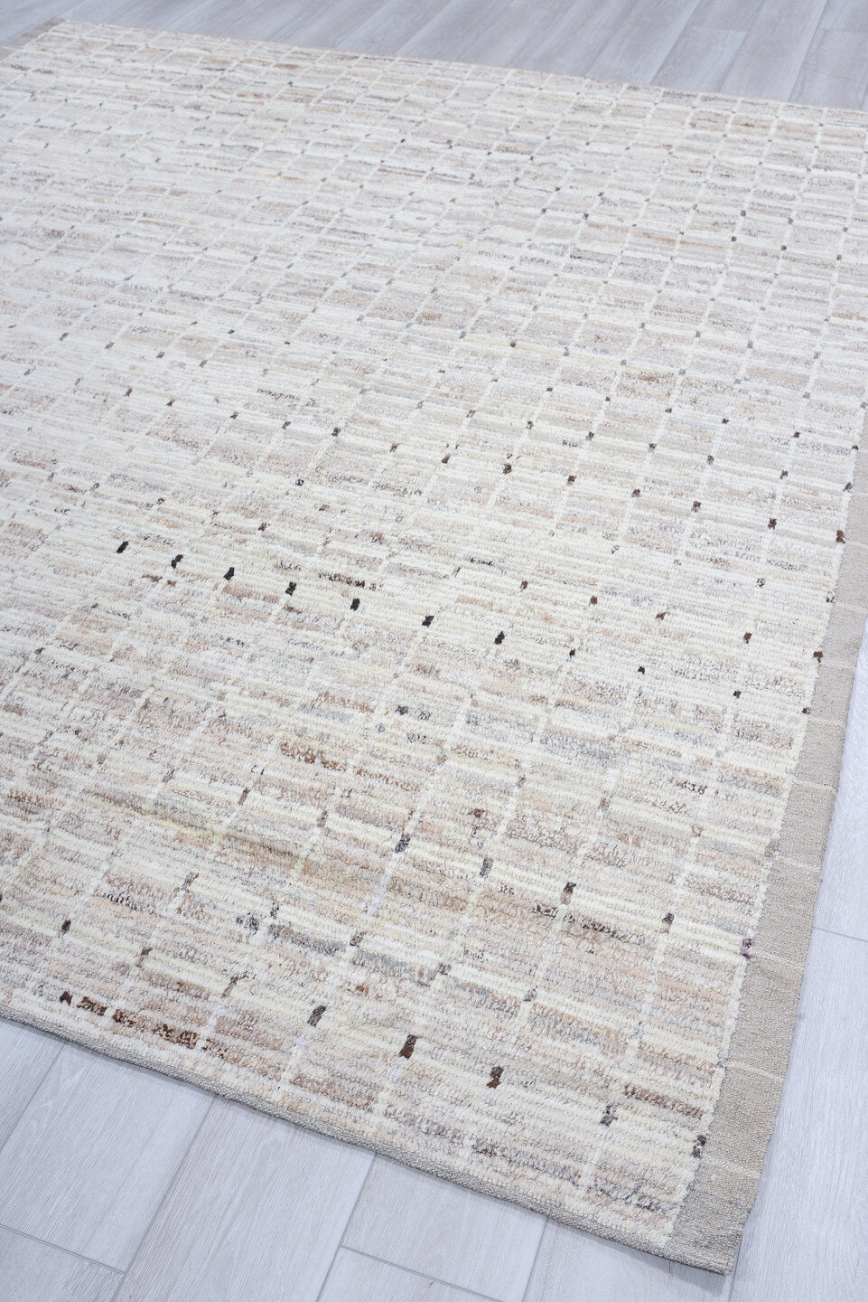 8' x 9' one-of-a-kind handmade vintage Tulu rug. Color palette: ivory, taupe, beige, gray, charcoal, black