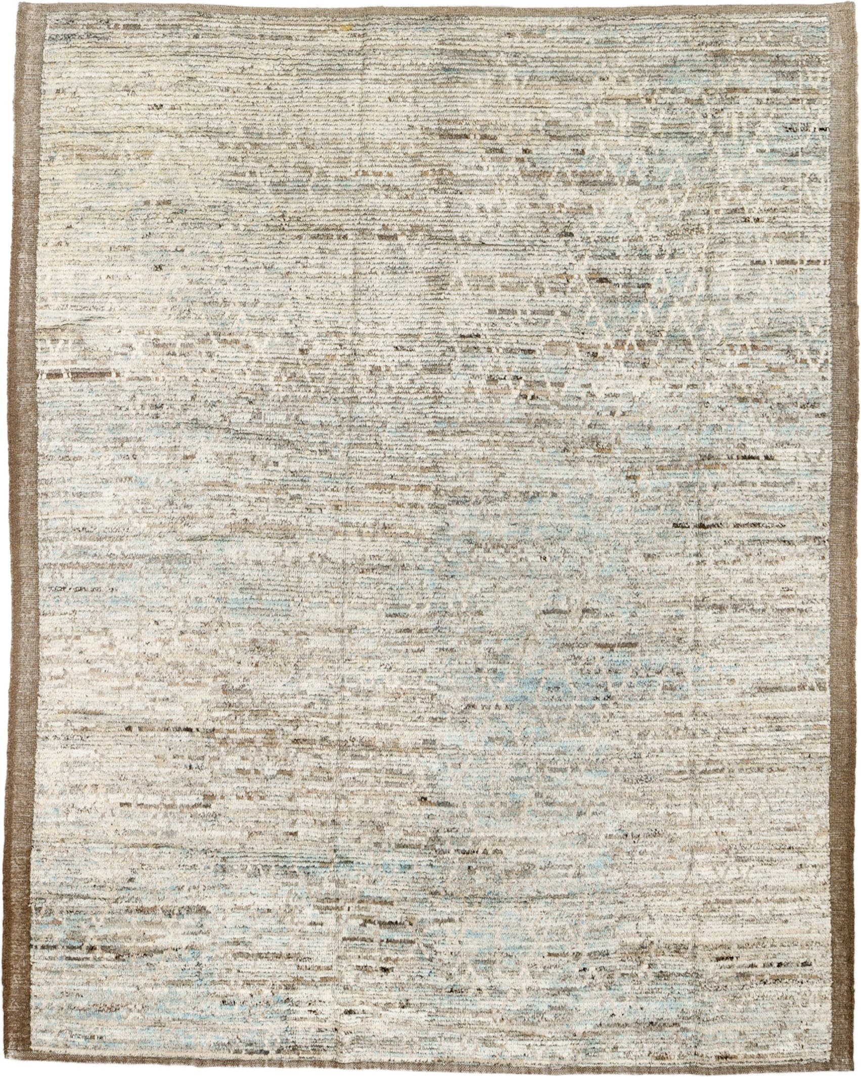 7' x 10' one-of-a-kind handmade vintage Tulu large size rug. Color palette: ivory, taupe, beige, pale blue, brown, cream