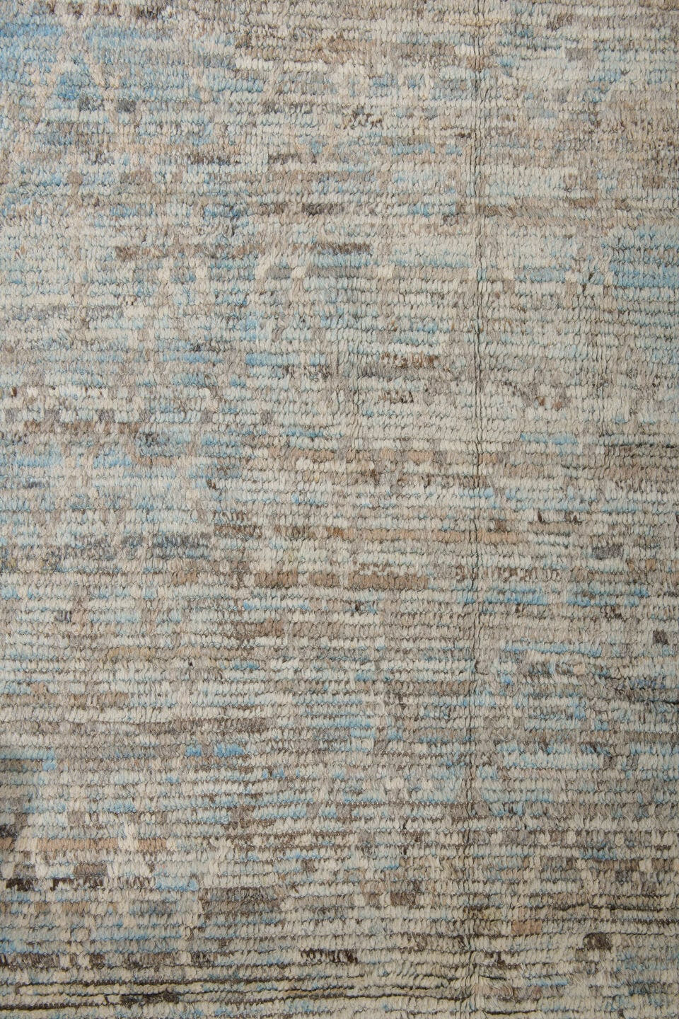 7' x 10' one-of-a-kind handmade vintage Tulu large size rug. Color palette: ivory, taupe, beige, pale blue, brown, cream