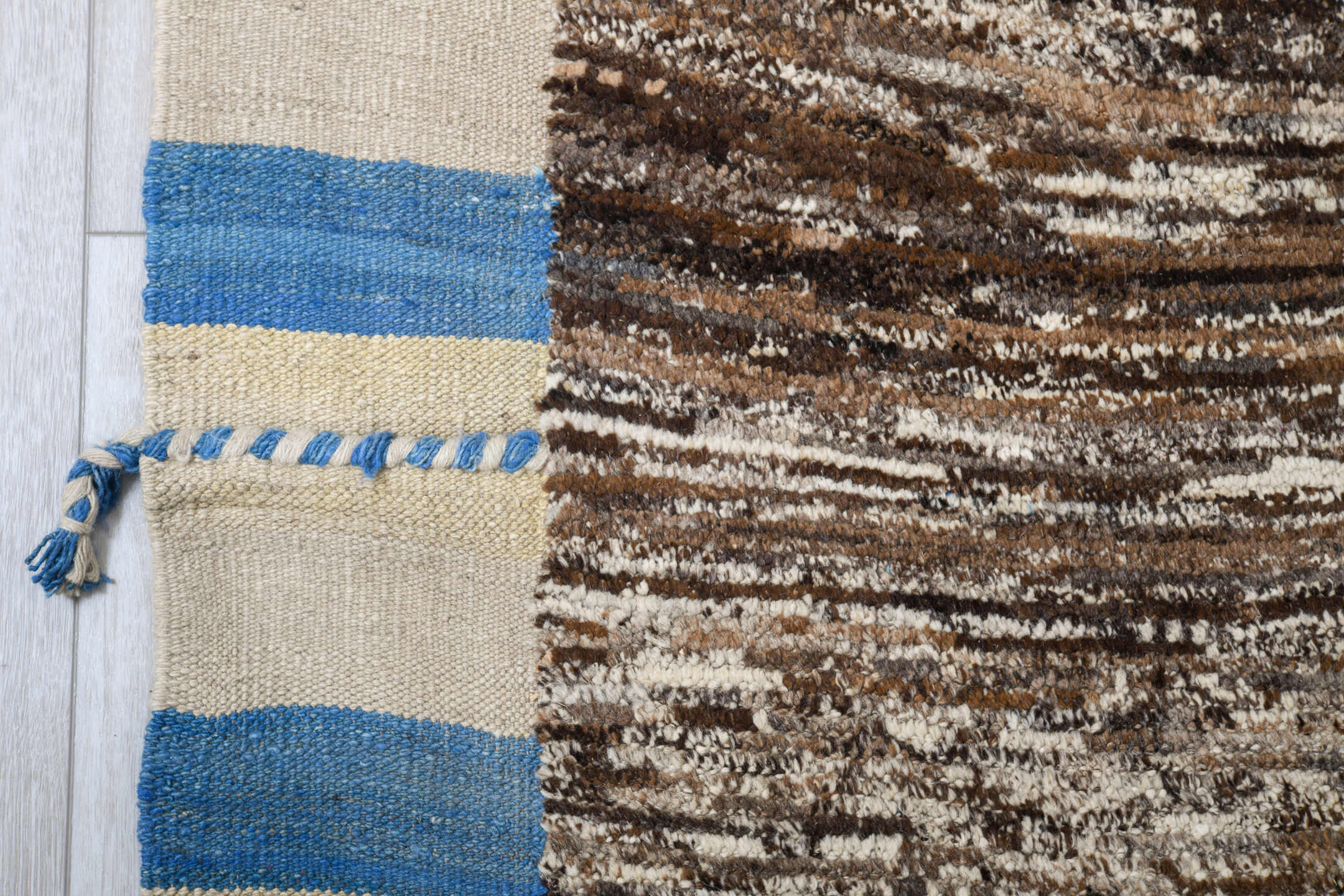 8' x 13' one-of-a-kind handmade vintage Tulu large size rug. Color palette: brown, ivory, sky blue, powder blue, camel