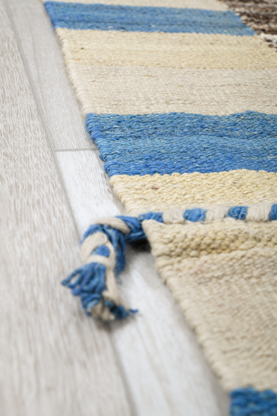8' x 13' one-of-a-kind handmade vintage Tulu large size rug. Color palette: brown, ivory, sky blue, powder blue, camel