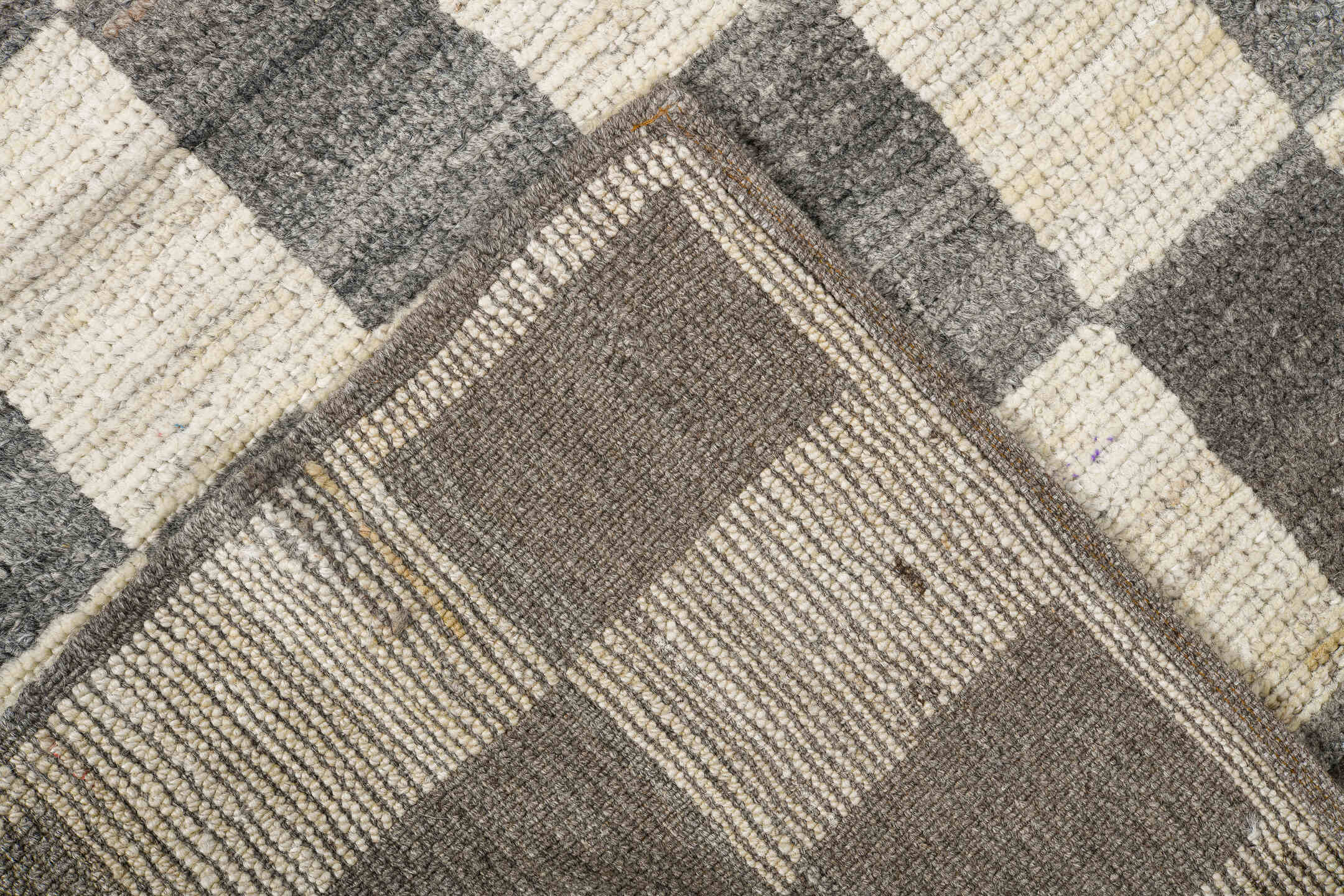 6' x 9' one-of-a-kind handmade vintage Tulu medium size rug. Color palette: ivory, charcoal, gray, taupe, black, beige