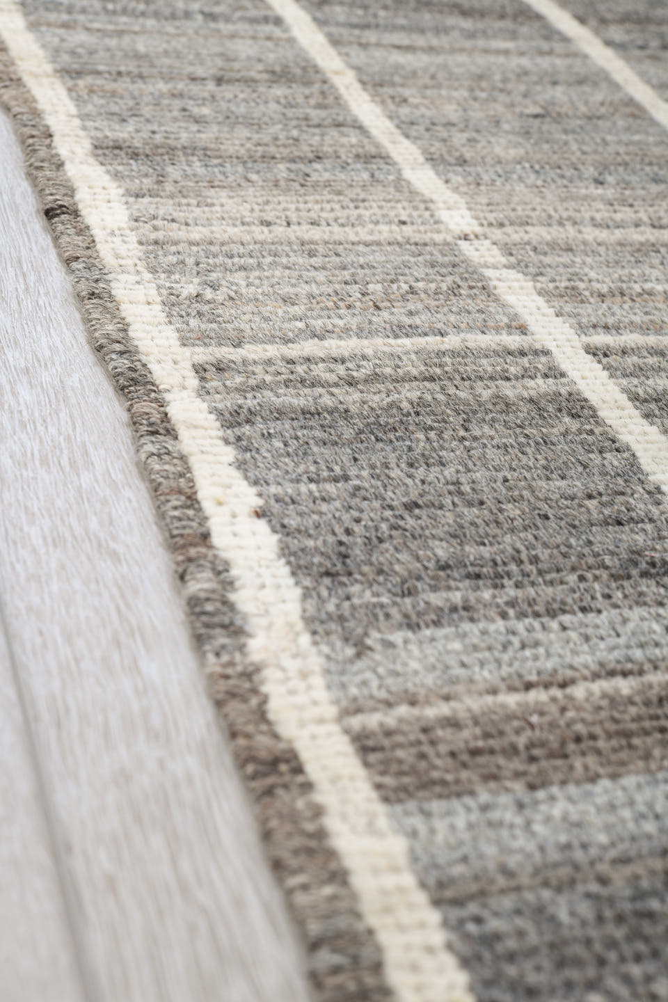 6' x 9' one-of-a-kind handmade vintage Tulu medium size rug. Color palette: ivory, charcoal, gray, taupe, black, beige