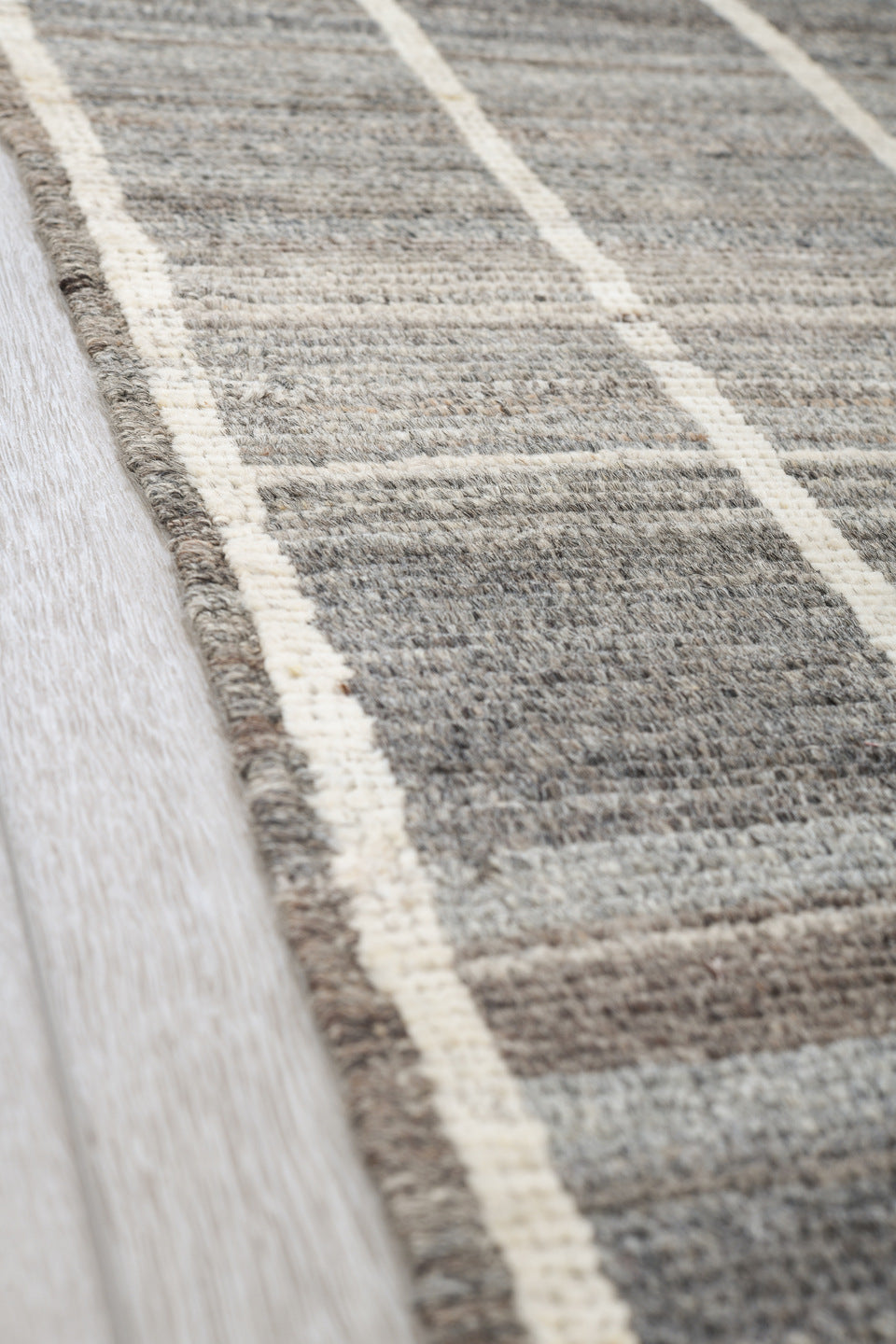 6' x 9' one-of-a-kind handmade vintage Tulu medium size rug. Color palette: ivory, charcoal, gray, taupe, black, beige