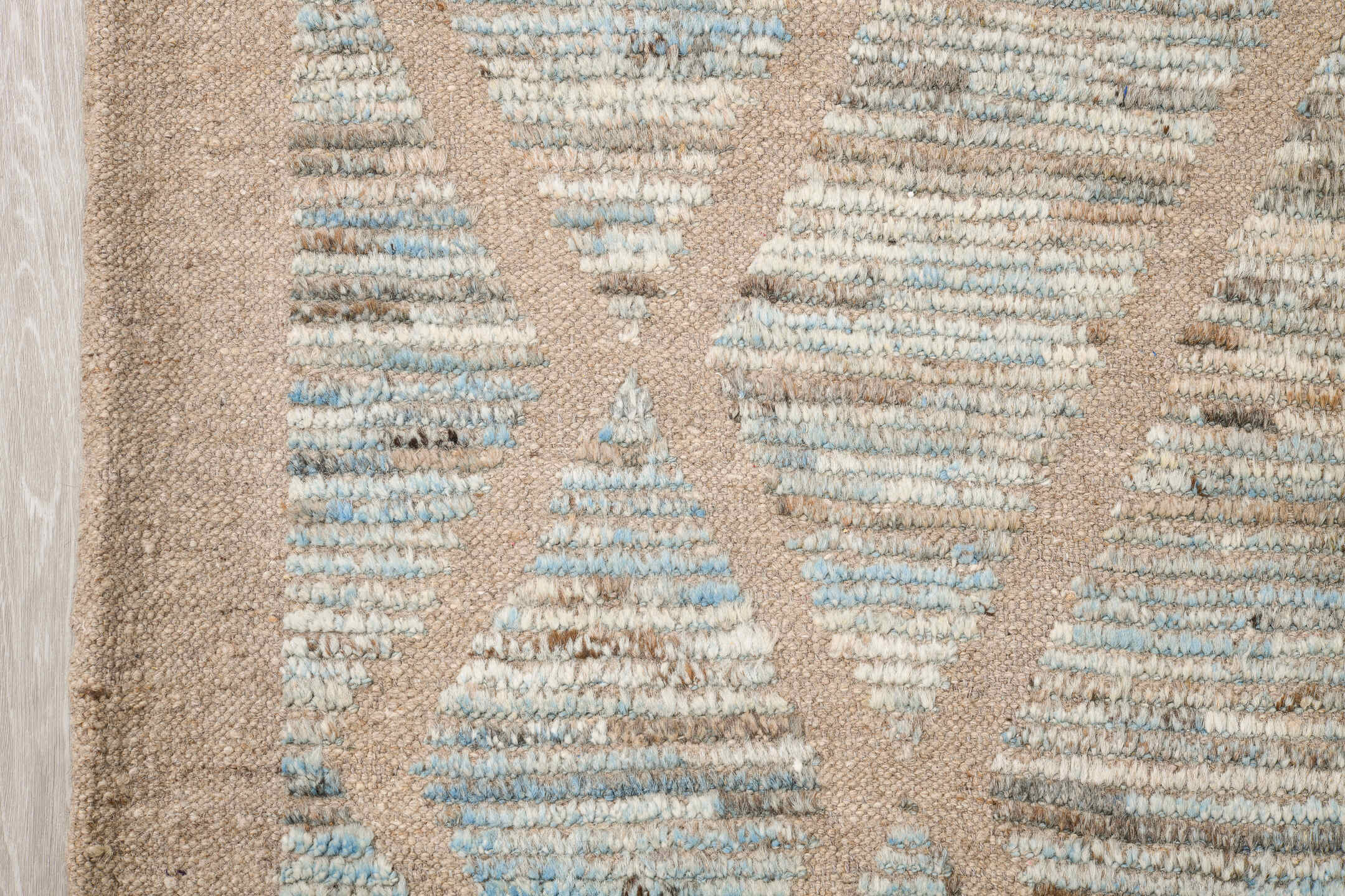 8' x 9' one-of-a-kind handmade vintage Tulu rug. Color palette: ivory, pale blue, taupe, beige, camel, brown, light blue