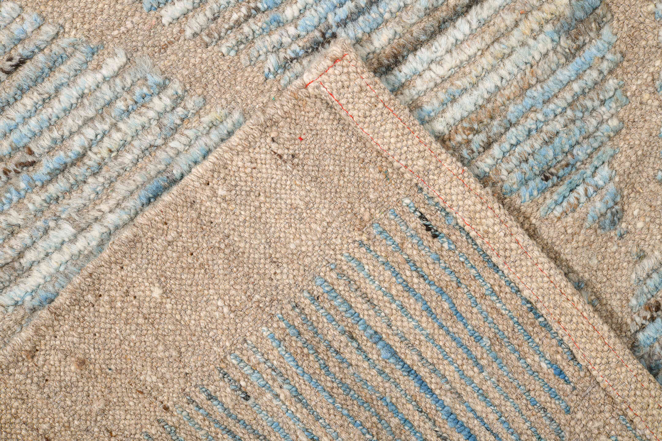 8' x 9' one-of-a-kind handmade vintage Tulu rug. Color palette: ivory, pale blue, taupe, beige, camel, brown, light blue