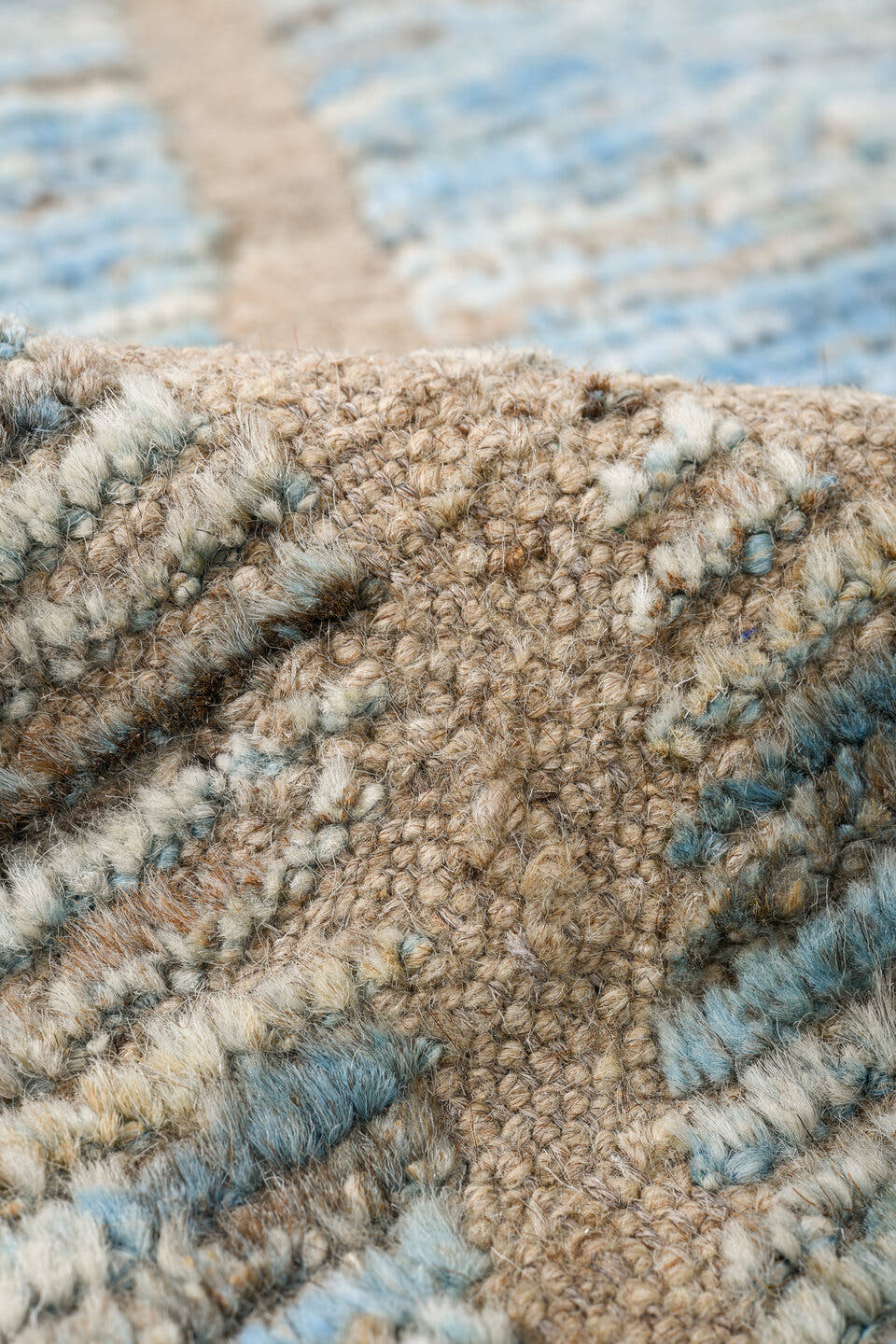 8' x 9' one-of-a-kind handmade vintage Tulu rug. Color palette: ivory, pale blue, taupe, beige, camel, brown, light blue