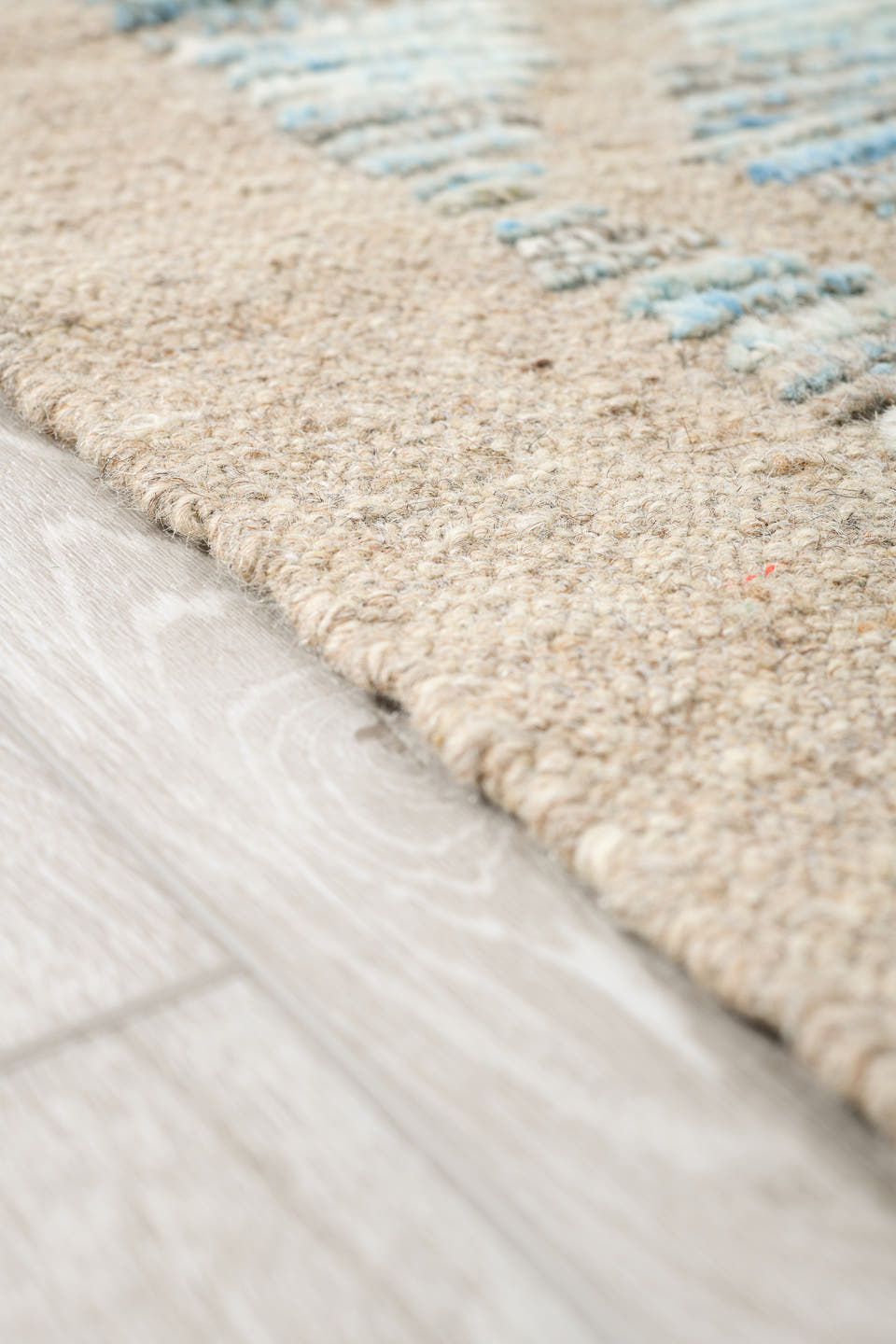8' x 9' one-of-a-kind handmade vintage Tulu rug. Color palette: ivory, pale blue, taupe, beige, camel, brown, light blue