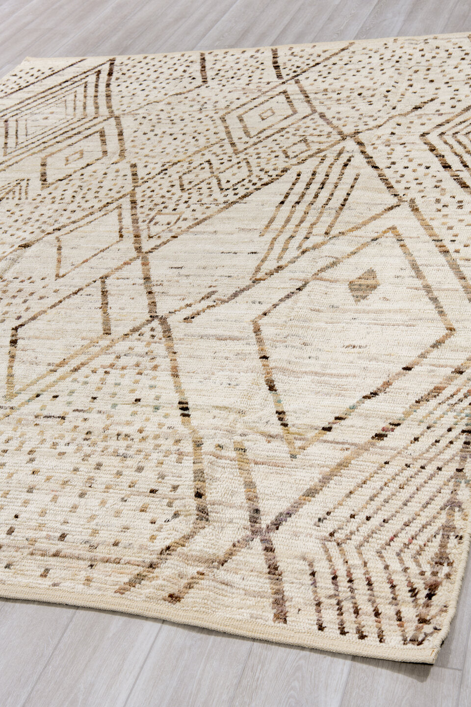 8' x 10' one-of-a-kind handmade vintage Tulu large size rug. Color palette: ivory, taupe, brown, camel, charcoal, beige
