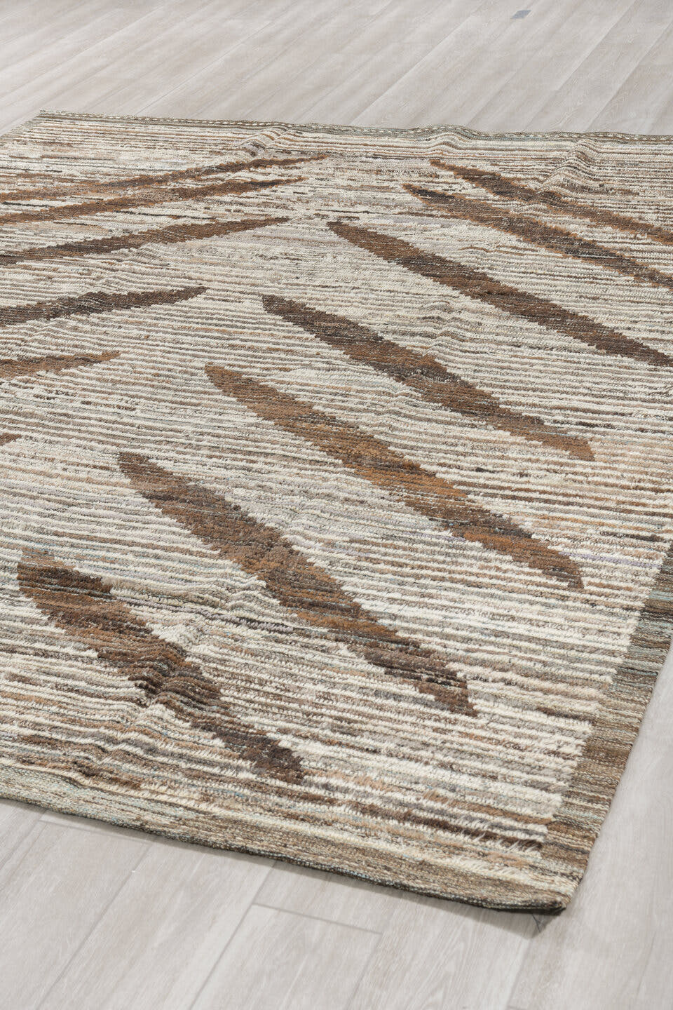 8' x 9' one-of-a-kind handmade vintage Tulu rug. Color palette: ivory, brown, taupe, charcoal, camel, beige, gray, black