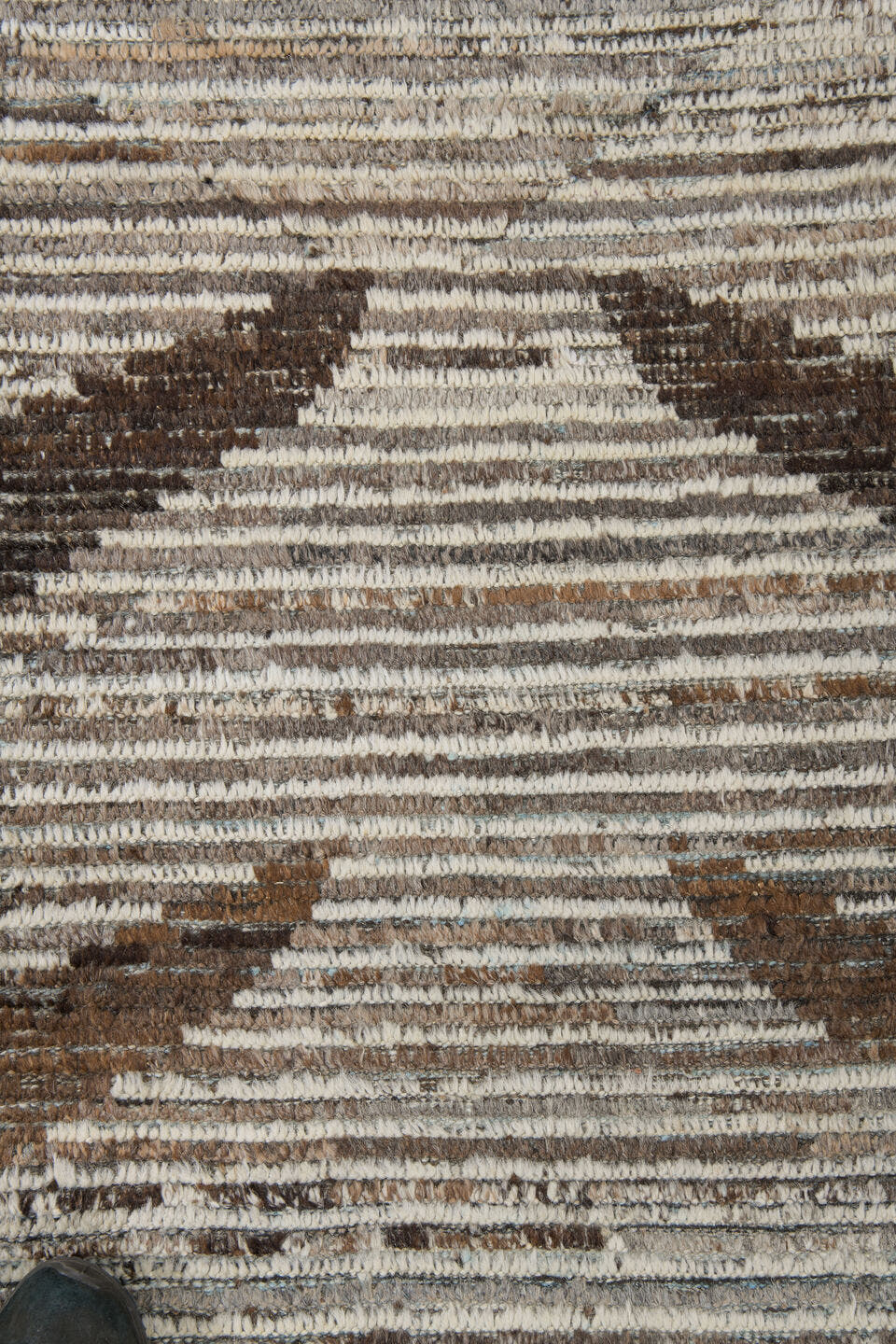8' x 9' one-of-a-kind handmade vintage Tulu rug. Color palette: ivory, brown, taupe, charcoal, camel, beige, gray, black