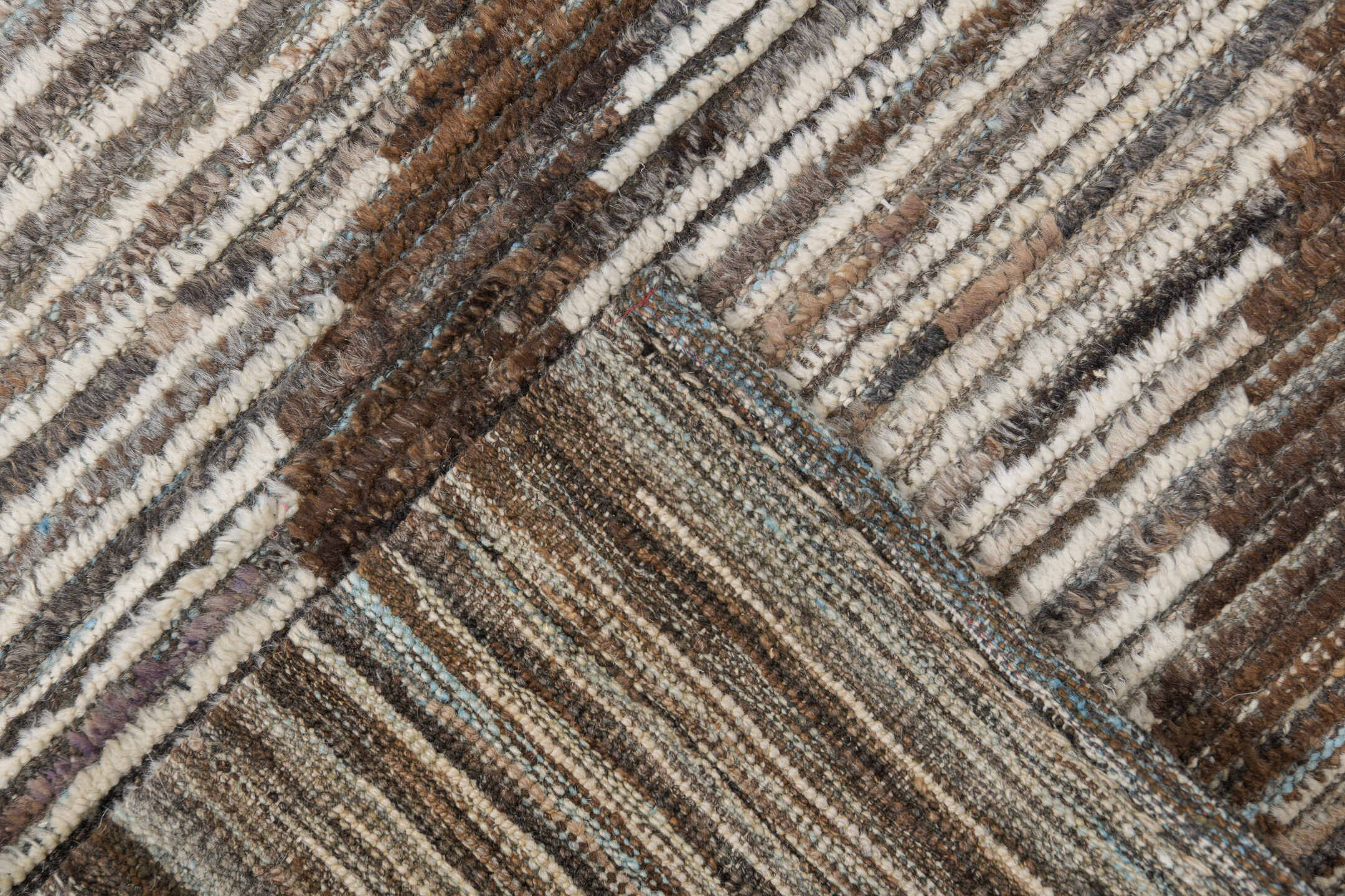 8' x 9' one-of-a-kind handmade vintage Tulu rug. Color palette: ivory, brown, taupe, charcoal, camel, beige, gray, black