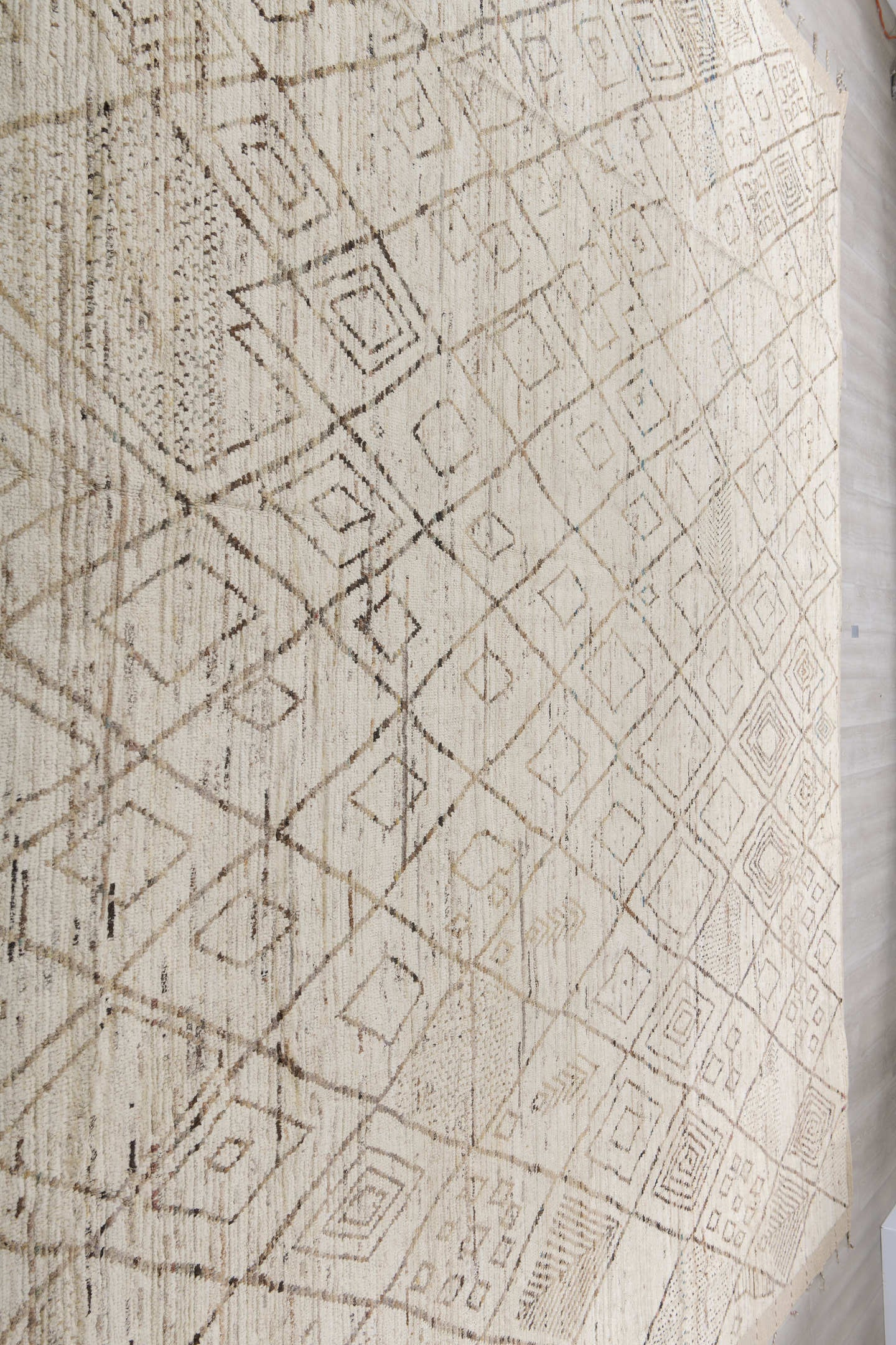 13' x 16' one-of-a-kind handmade vintage Tulu oversize rug. Color palette: ivory, cream, taupe, light brown, sand