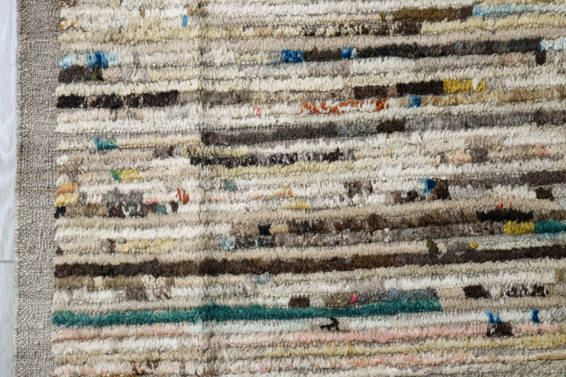 11' x 13' one-of-a-kind handmade vintage Tulu oversize rug. Color palette: ivory, taupe, brown, charcoal, blue, blush, cream
