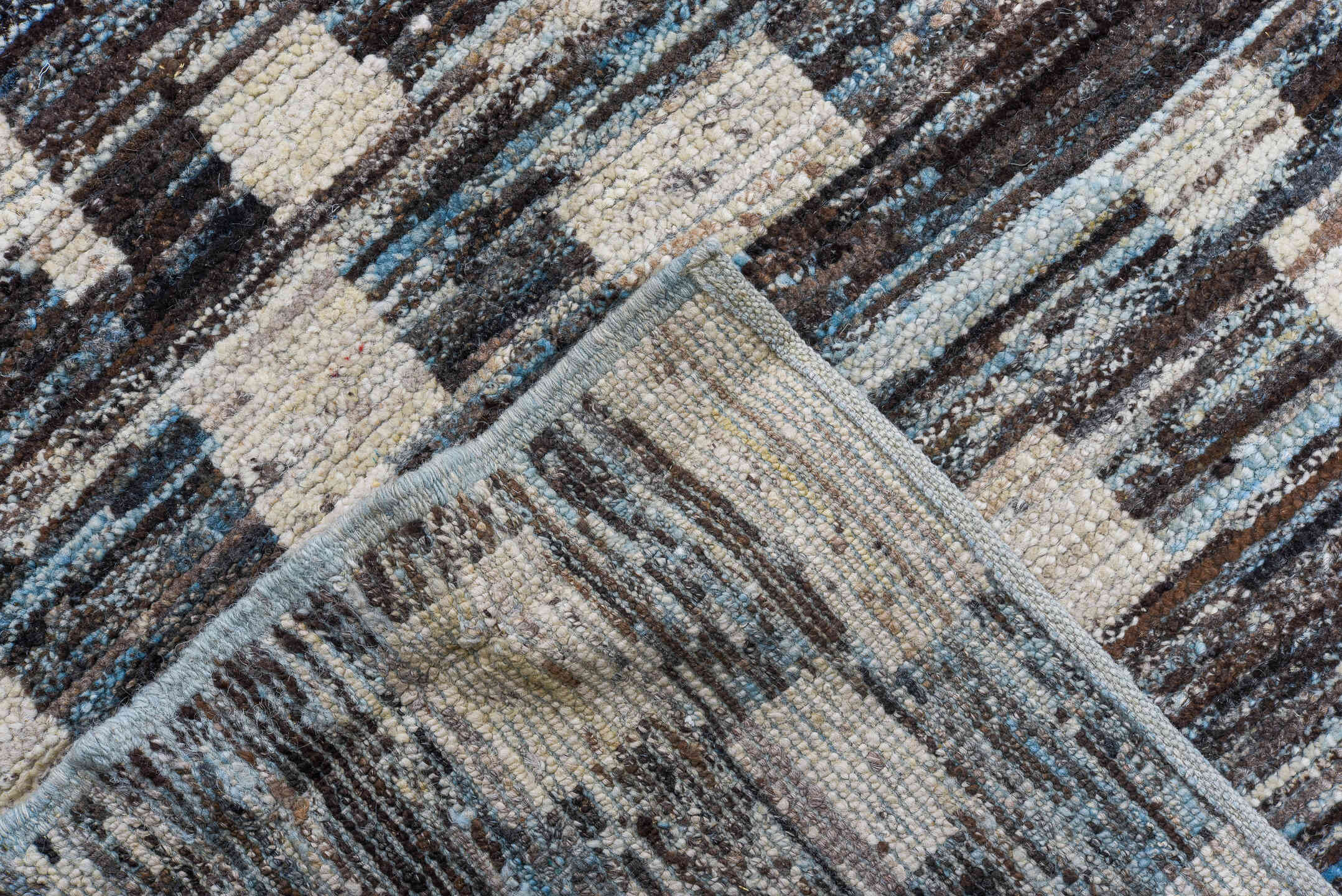 10' x 14' one-of-a-kind handmade vintage Tulu large size rug. Color palette: charcoal, ivory, slate, sky blue, taupe, gray