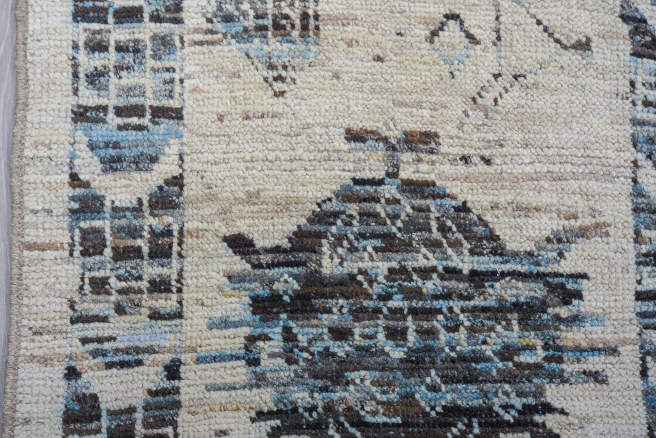 9' x 13' one-of-a-kind handmade vintage Tulu large size rug. Color palette: ivory, charcoal, pale blue, slate, cream, gray
