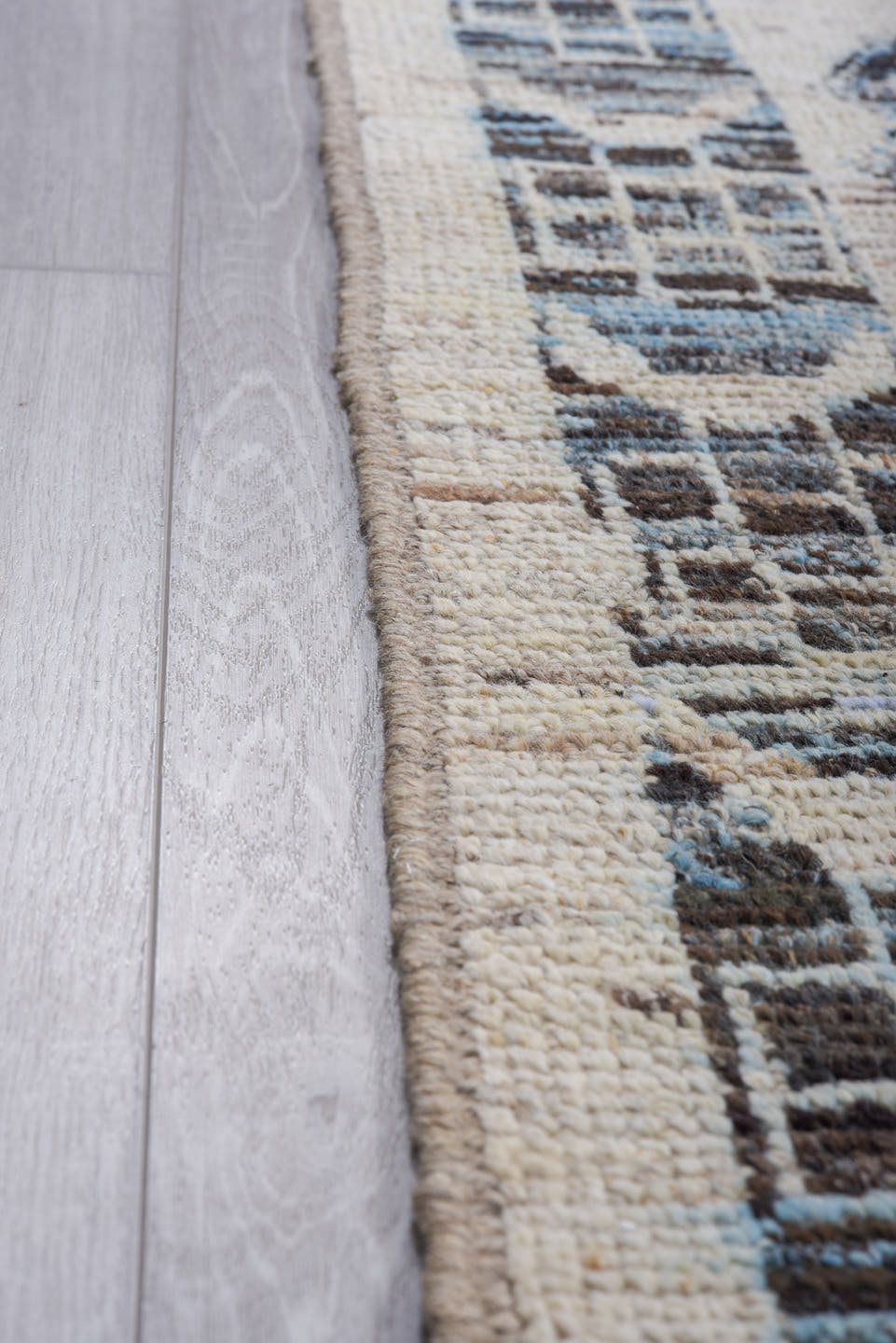 9' x 13' one-of-a-kind handmade vintage Tulu large size rug. Color palette: ivory, charcoal, pale blue, slate, cream, gray