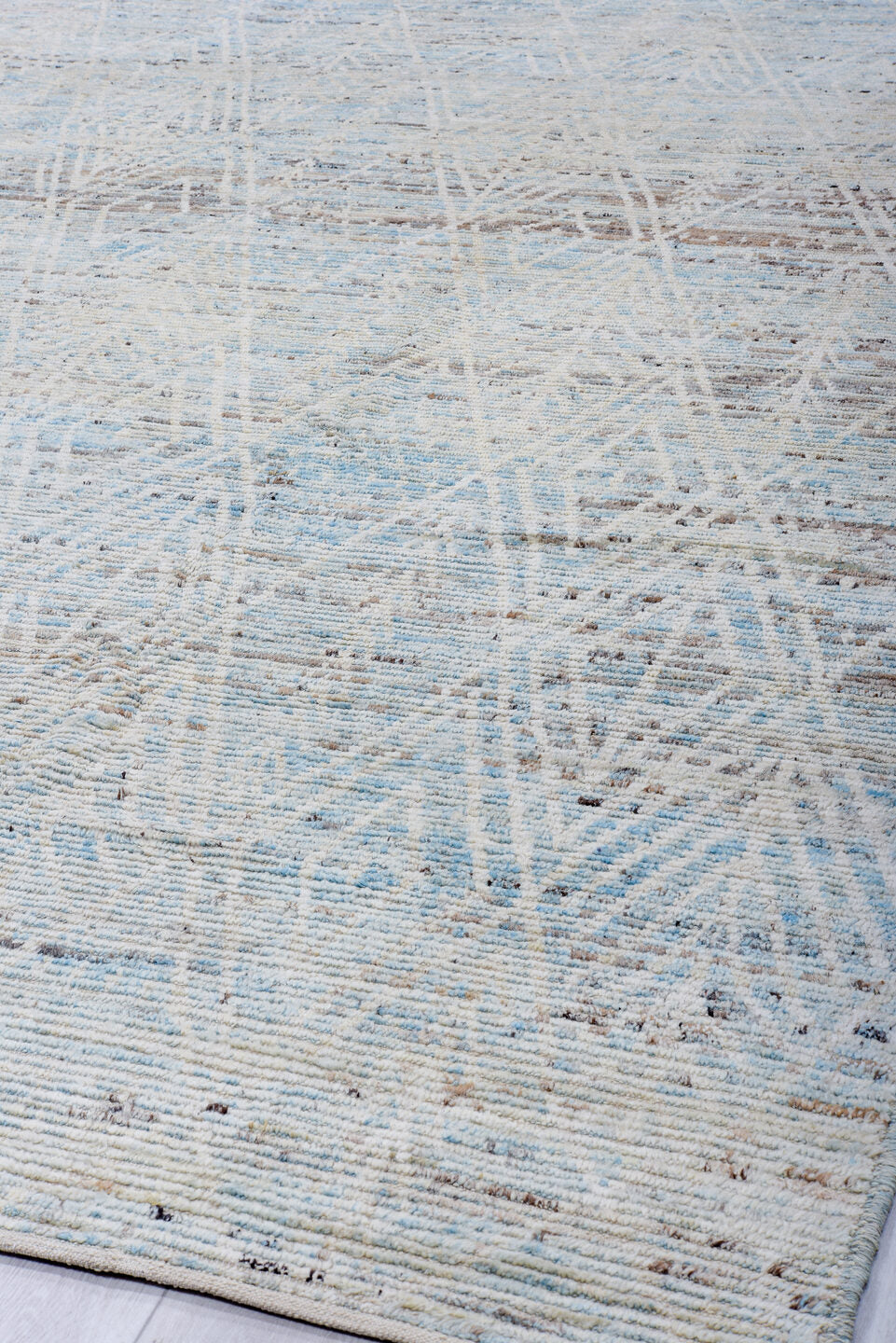 9' x 13' one-of-a-kind handmade vintage Tulu large size rug. Color palette: ivory, pale blue, taupe, light gray, light blue