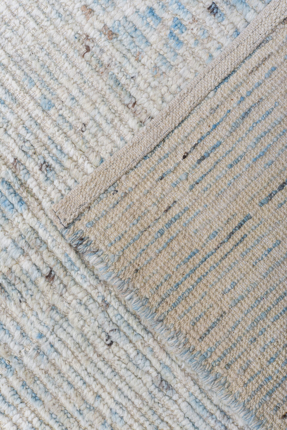 9' x 13' one-of-a-kind handmade vintage Tulu large size rug. Color palette: ivory, pale blue, taupe, light gray, light blue