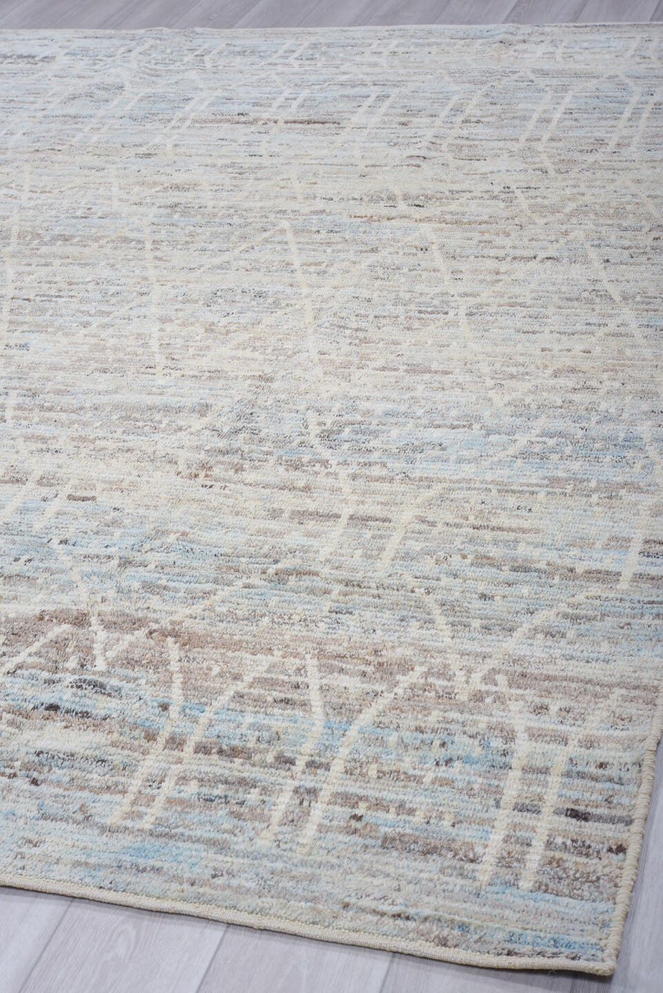8' x 9' one-of-a-kind handmade vintage Tulu rug. Color palette: ivory, pale blue, taupe, light gray, light blue, beige, gray