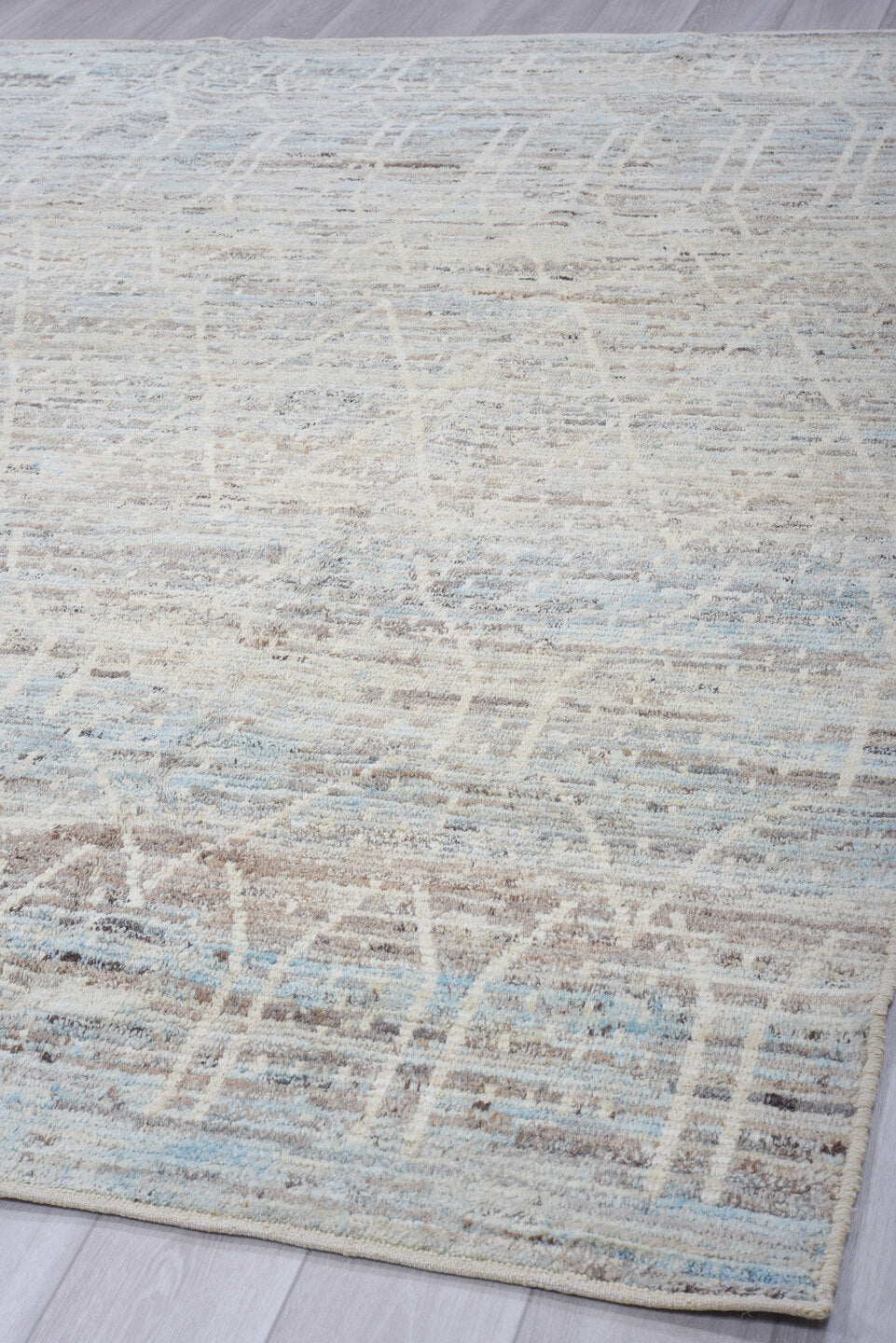 8' x 9' one-of-a-kind handmade vintage Tulu rug. Color palette: ivory, pale blue, taupe, light gray, light blue, beige, gray
