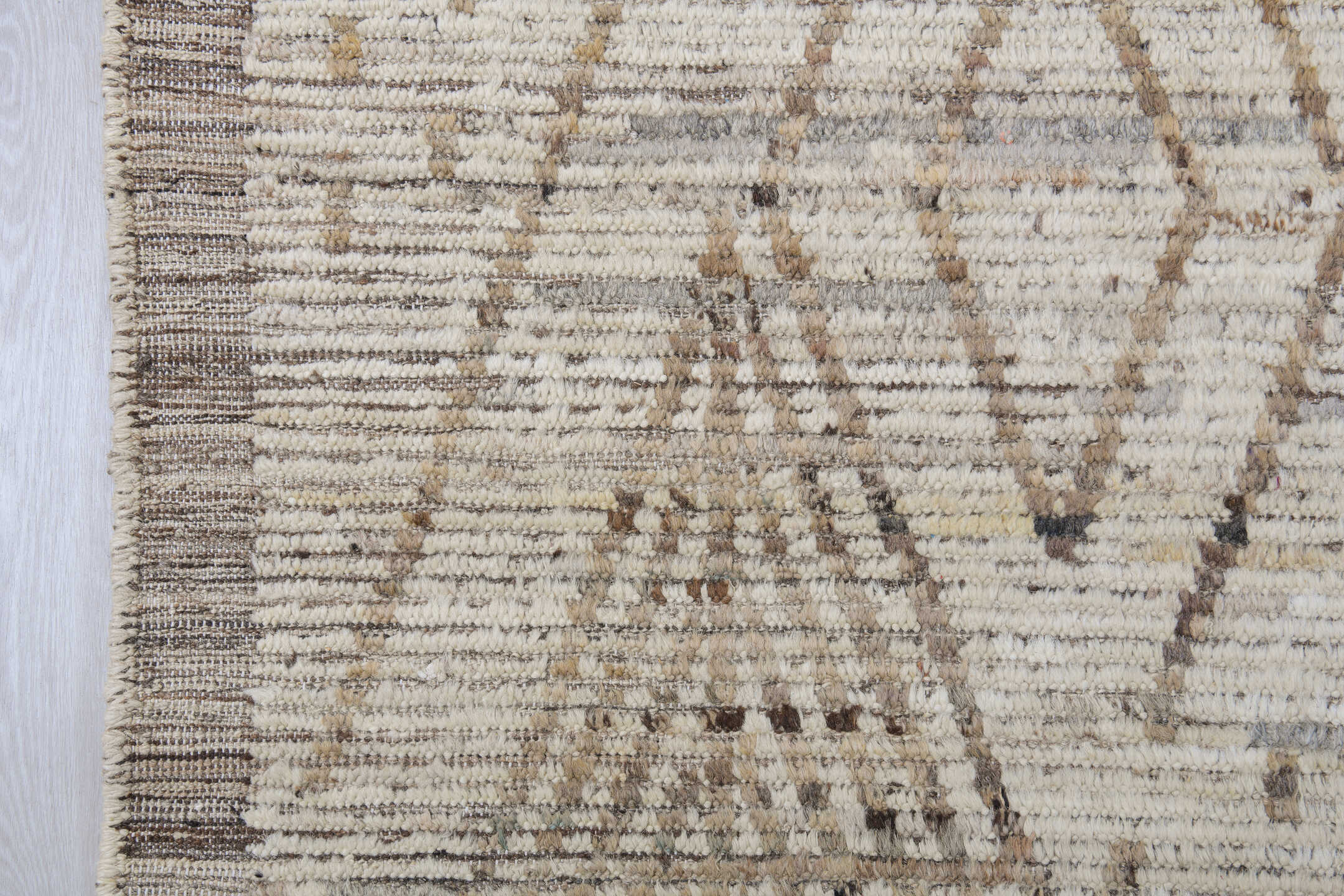 10' x 13' one-of-a-kind handmade vintage Tulu large size rug. Color palette: ivory, taupe, brown, charcoal, cream, beige