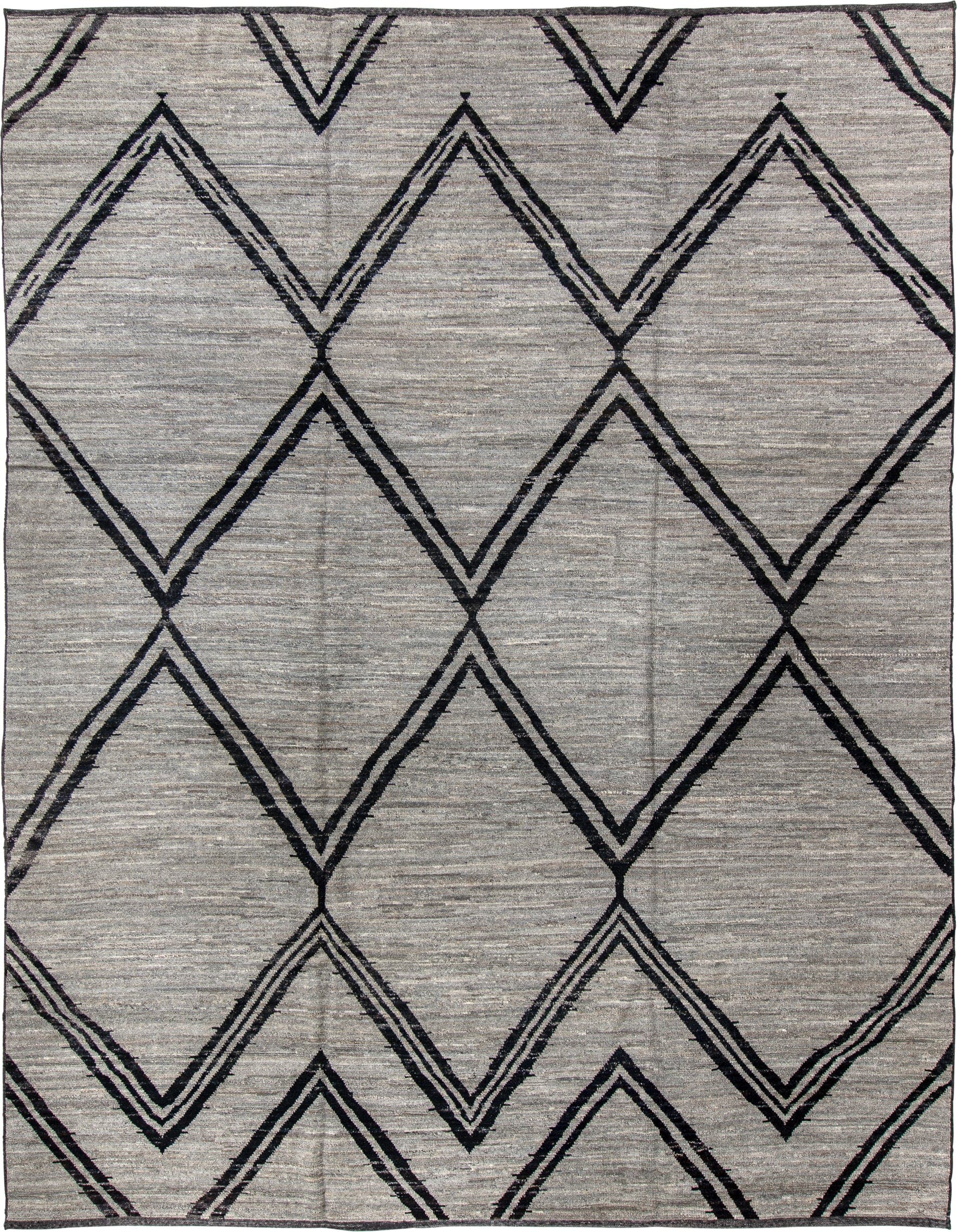 9' x 12' one-of-a-kind handmade vintage Tulu large size rug. Color palette: gray, charcoal, ivory, black