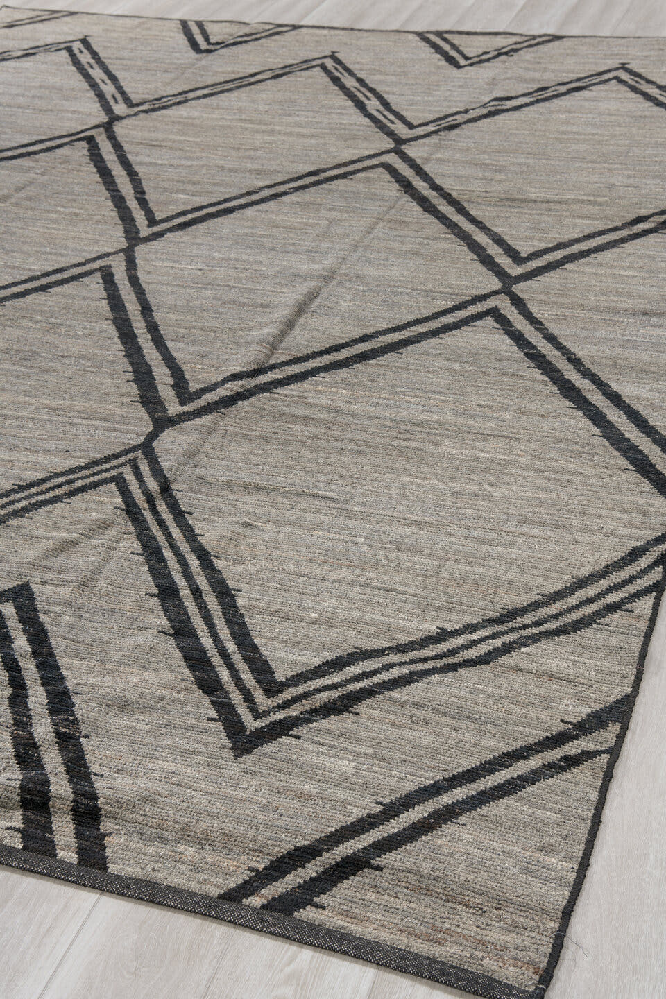 9' x 12' one-of-a-kind handmade vintage Tulu large size rug. Color palette: gray, charcoal, ivory, black