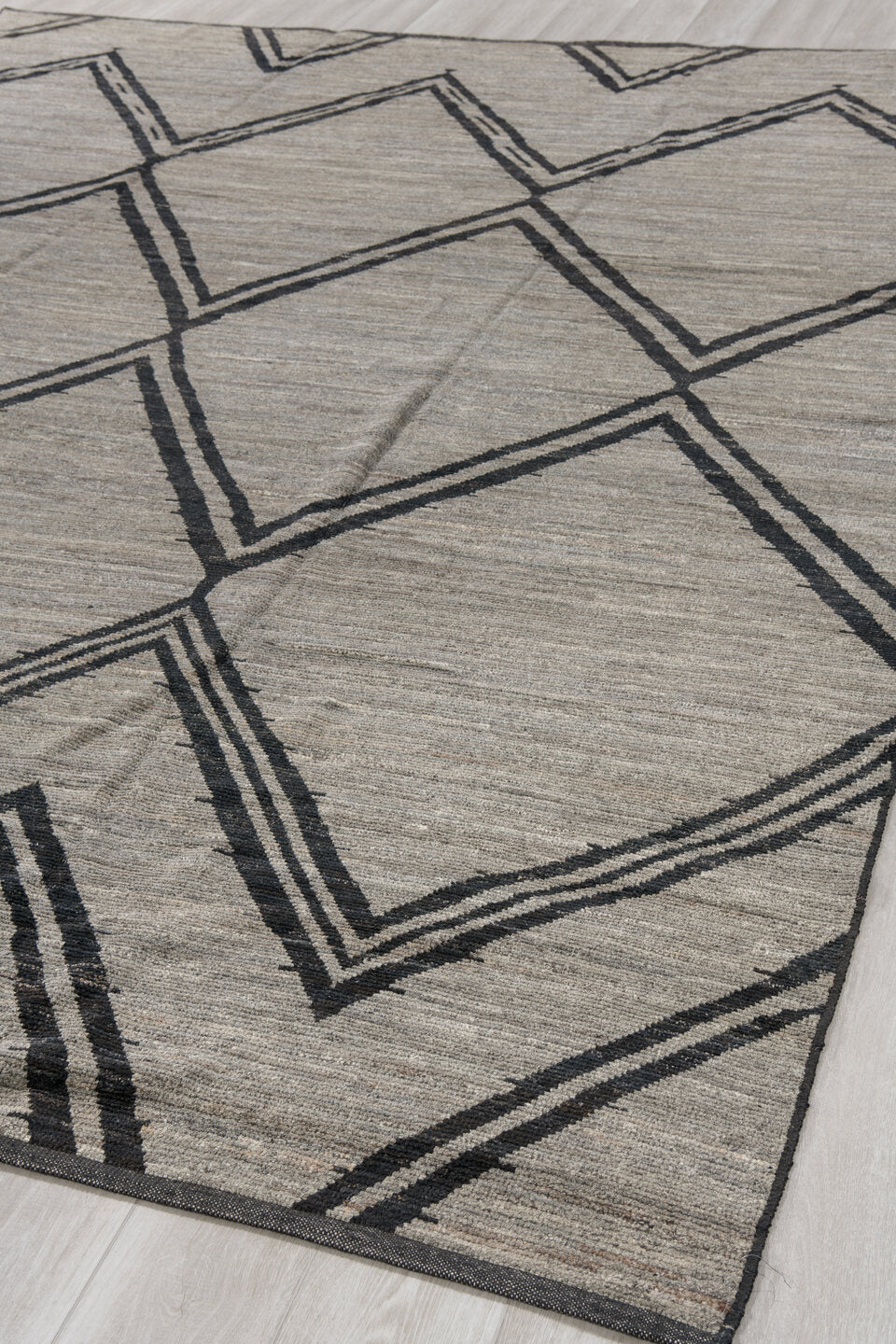 9' x 12' one-of-a-kind handmade vintage Tulu large size rug. Color palette: gray, charcoal, ivory, black