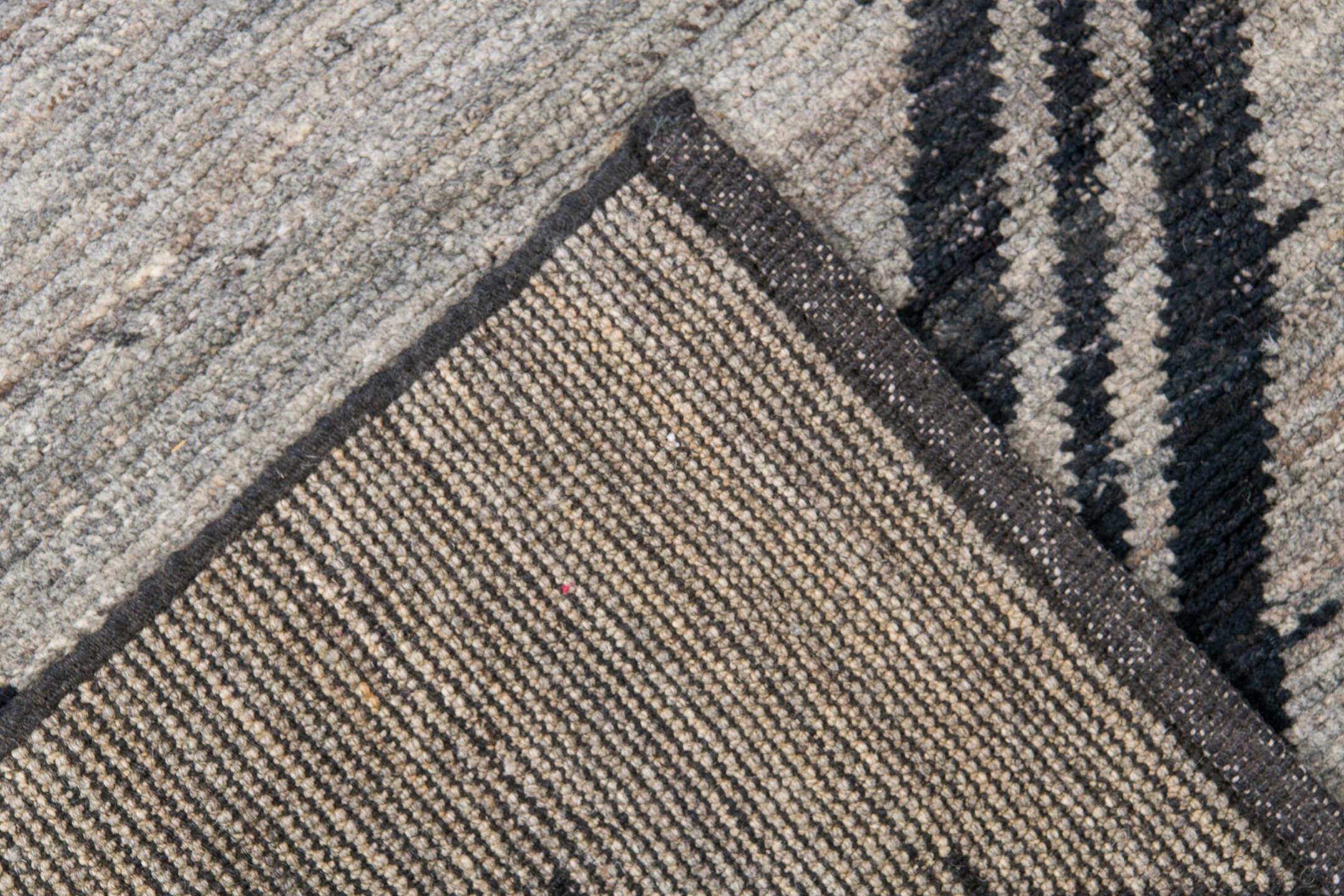 9' x 12' one-of-a-kind handmade vintage Tulu large size rug. Color palette: gray, charcoal, ivory, black