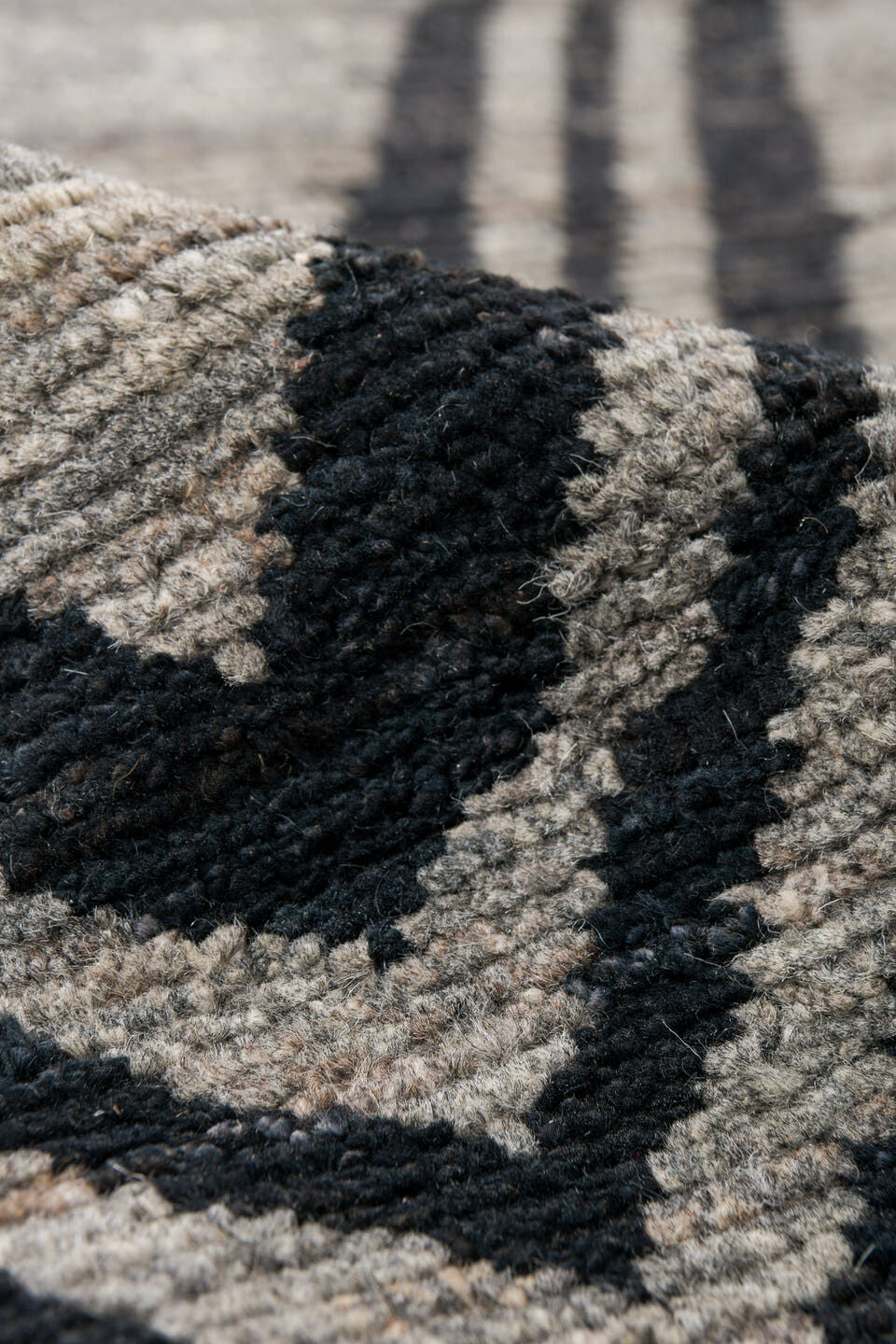 9' x 12' one-of-a-kind handmade vintage Tulu large size rug. Color palette: gray, charcoal, ivory, black