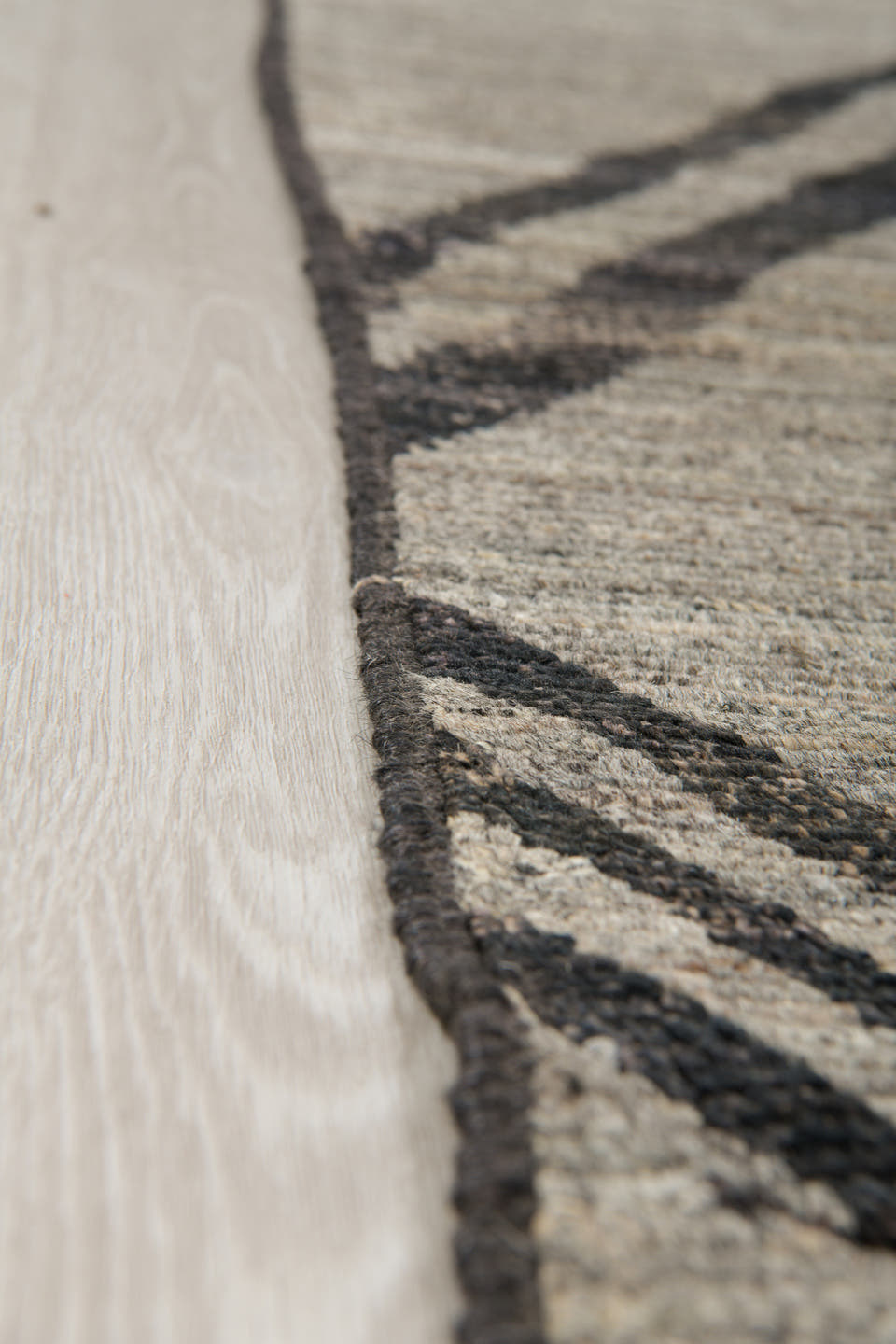 9' x 12' one-of-a-kind handmade vintage Tulu large size rug. Color palette: gray, charcoal, ivory, black
