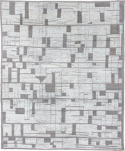 10' x 12' one-of-a-kind handmade vintage Tulu large size rug. Color palette: ivory, charcoal, taupe, gray, black, beige