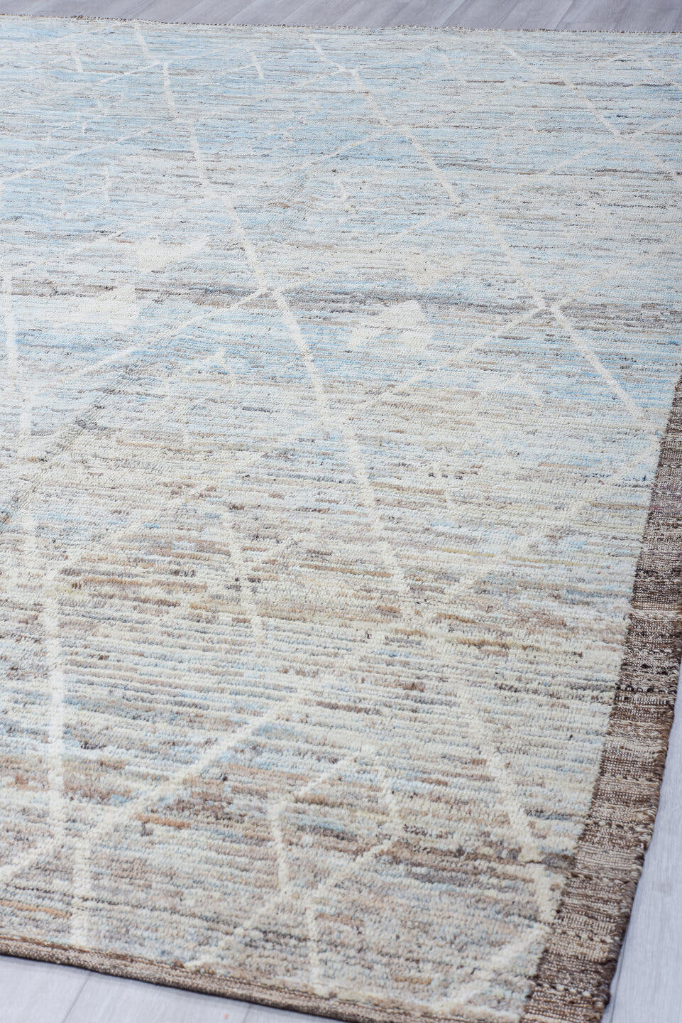 10' x 13' one-of-a-kind handmade vintage Tulu large size rug. Color palette: light blue, ivory, taupe, gray, brown, beige