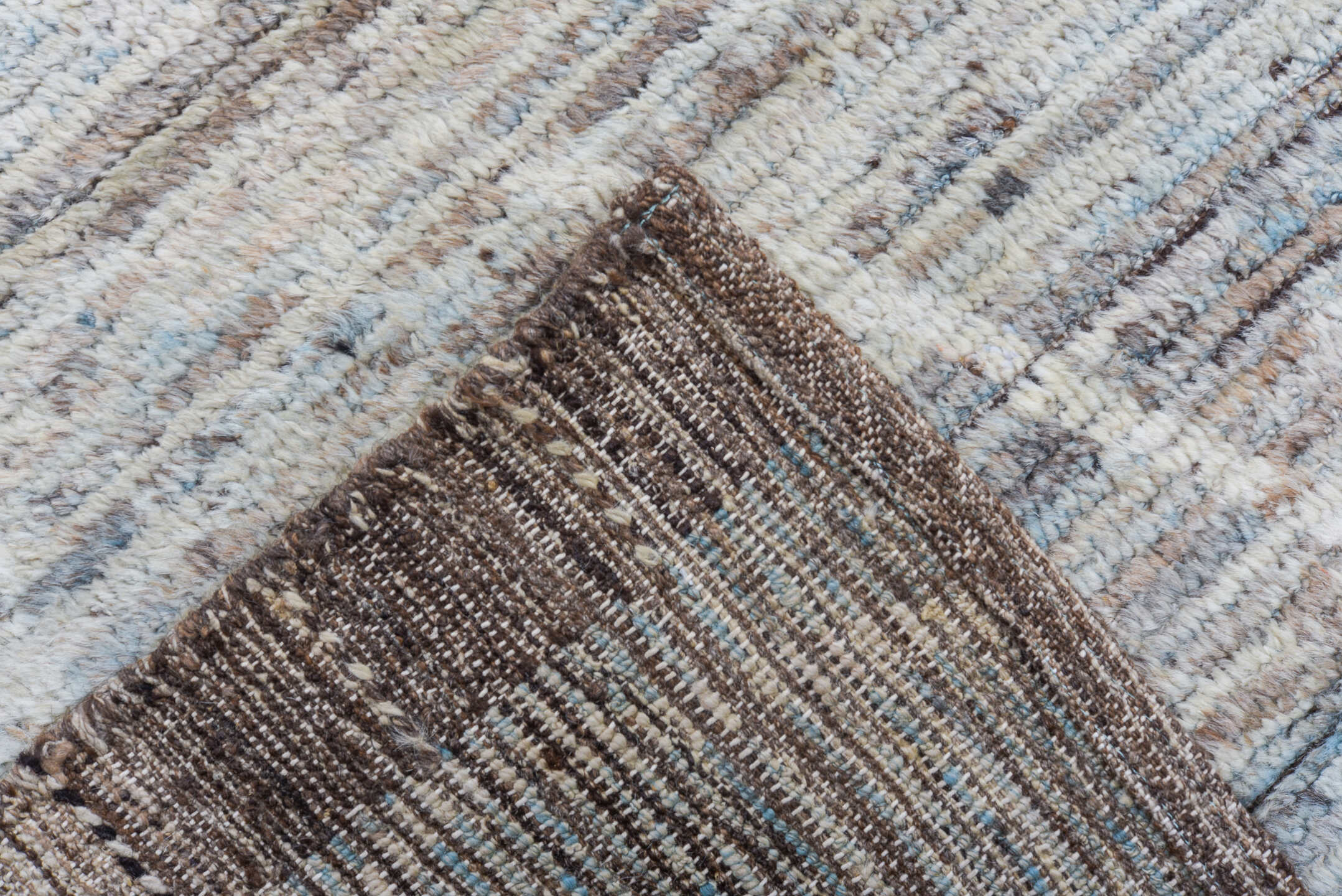 10' x 13' one-of-a-kind handmade vintage Tulu large size rug. Color palette: light blue, ivory, taupe, gray, brown, beige