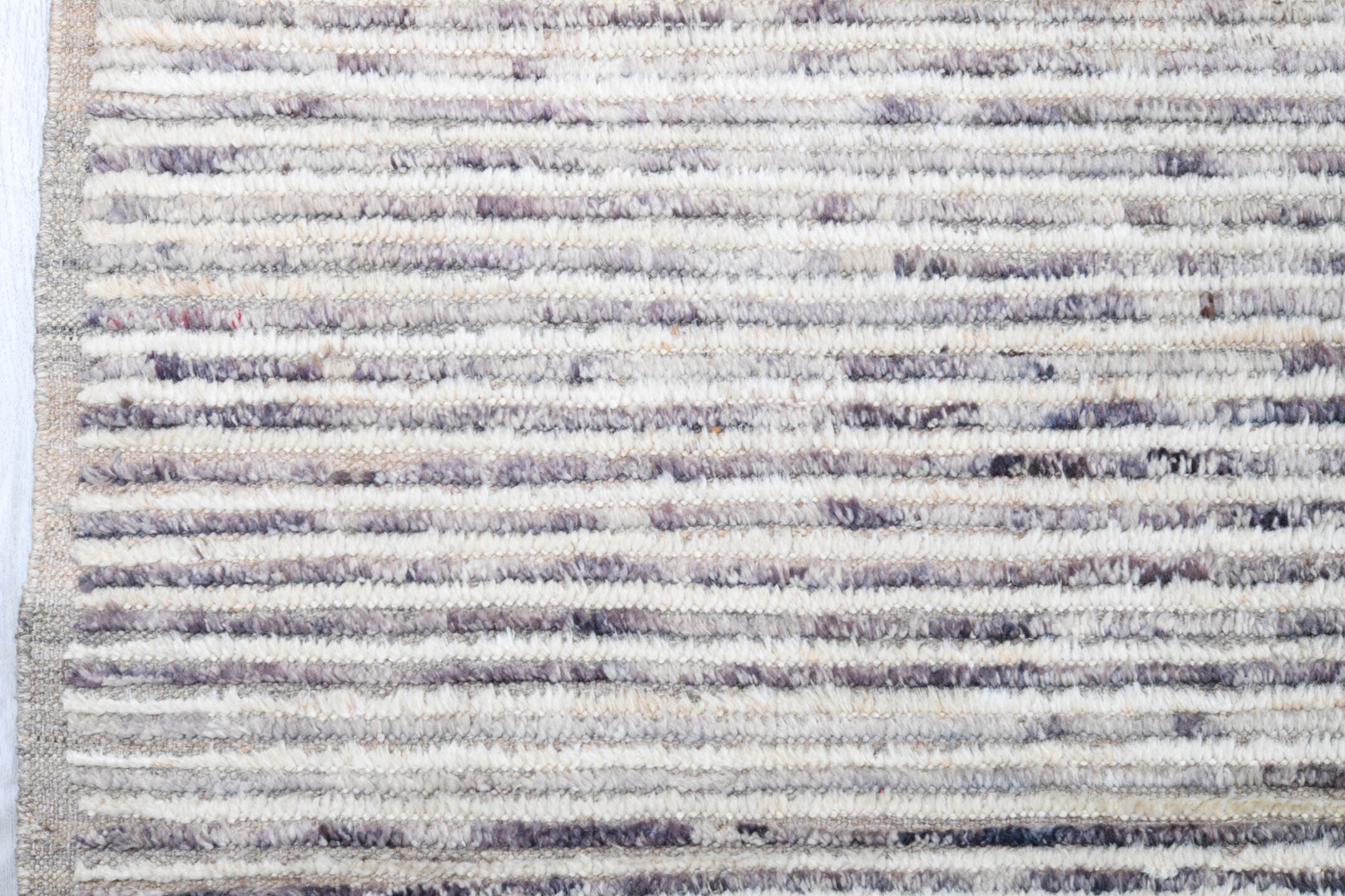 12' x 15' one-of-a-kind handmade vintage Tulu oversize rug. Color palette: ivory, charcoal, slate, rust, taupe, gray, black