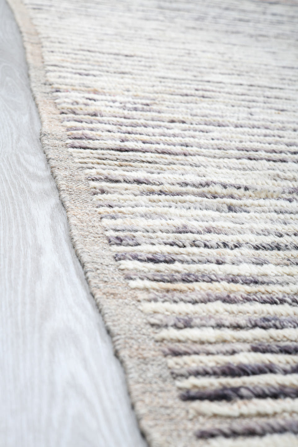 12' x 15' one-of-a-kind handmade vintage Tulu oversize rug. Color palette: ivory, charcoal, slate, rust, taupe, gray, black
