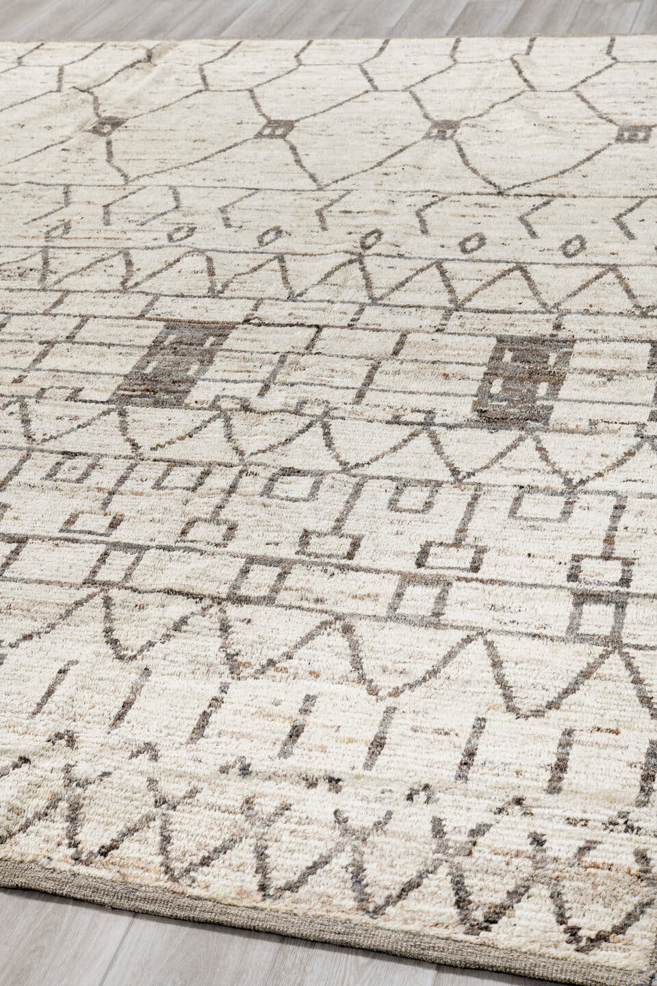 9' x 11' one-of-a-kind handmade vintage Tulu large size rug. Color palette: ivory, charcoal, taupe, cream, gray, black