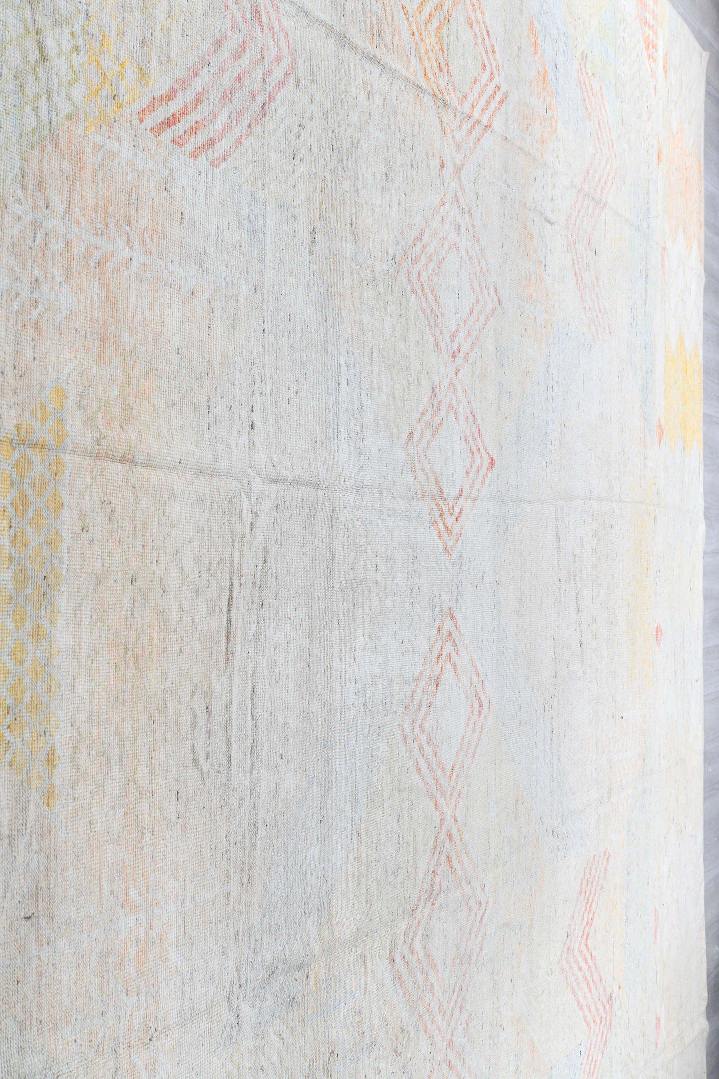 14' x 19' one-of-a-kind handmade vintage Tulu oversize rug. Color palette: ivory, blush, pale blue, soft gold, cream, sand